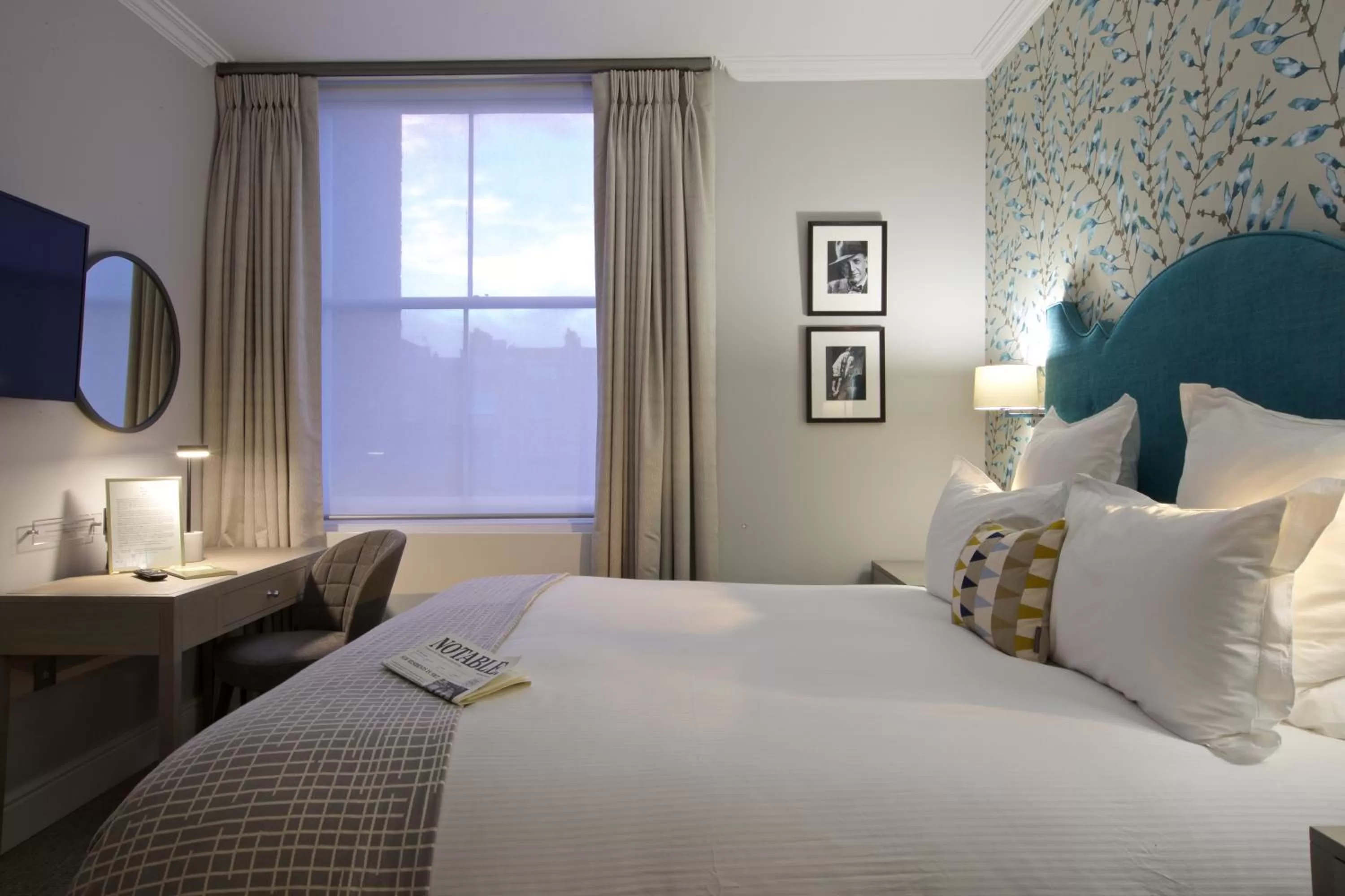 Bed in 54 Queen's Gate Hotel