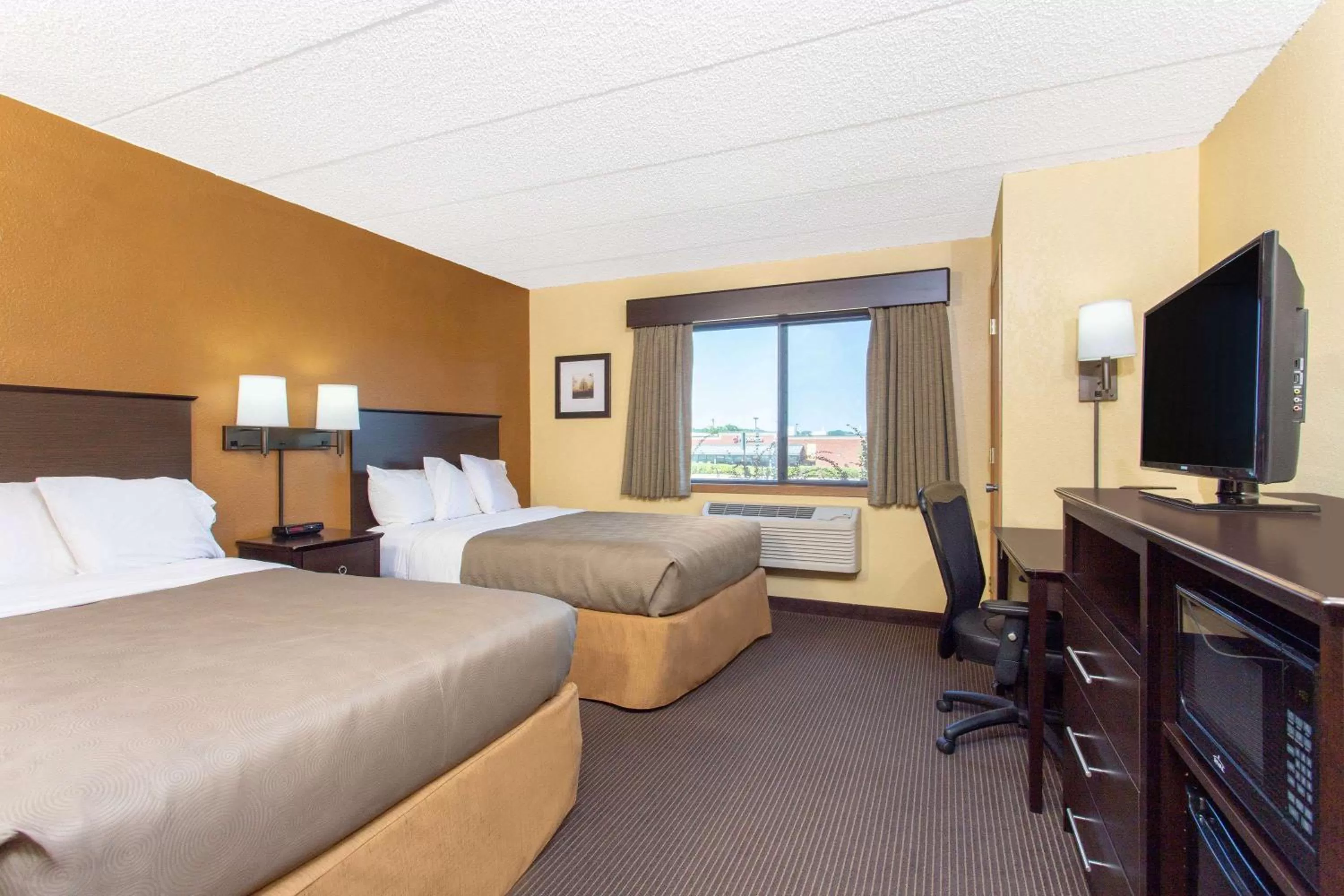 Photo of the whole room, Bed in AmericInn by Wyndham West Bend