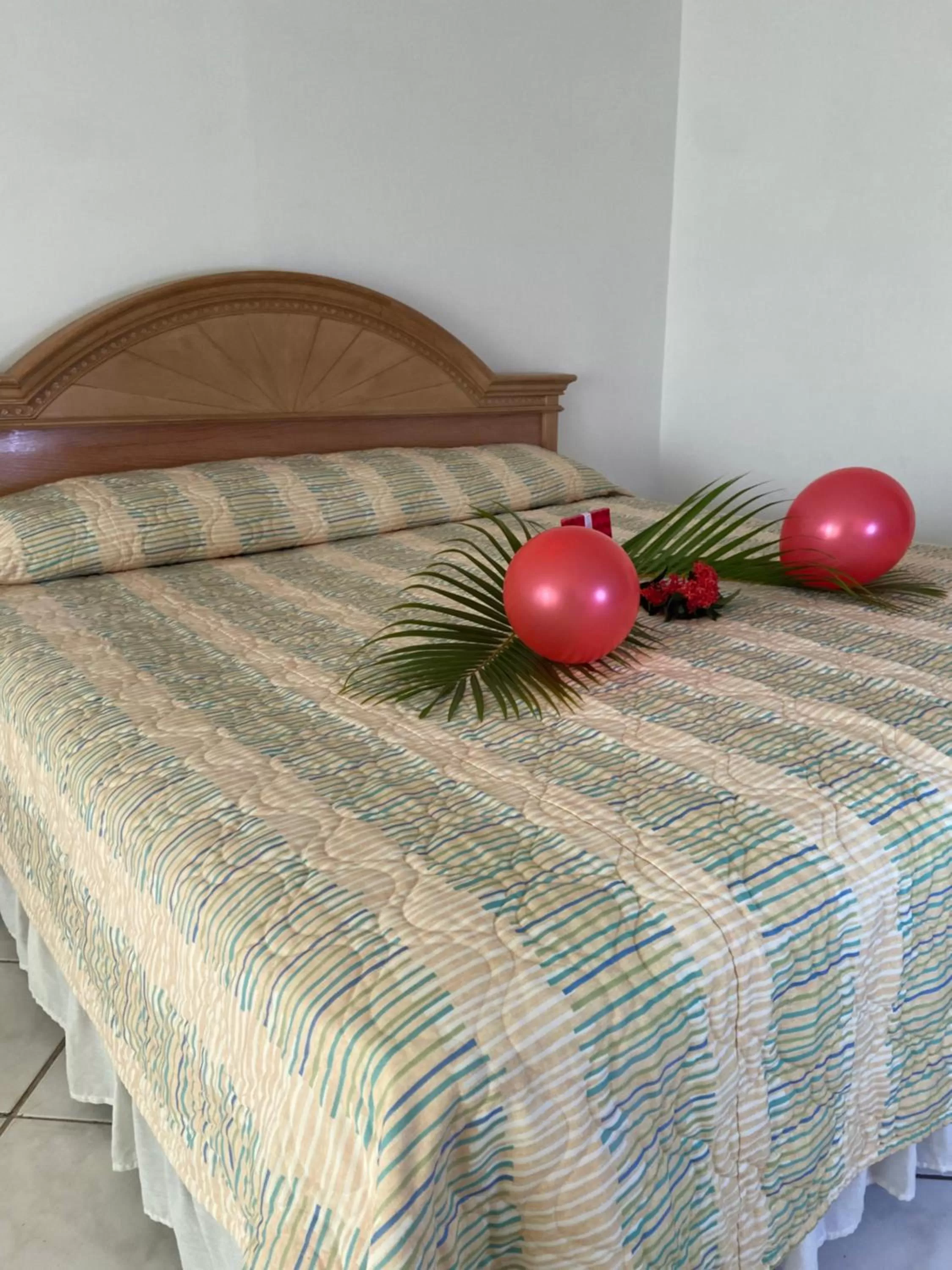 Bed in The Downtown Hotel