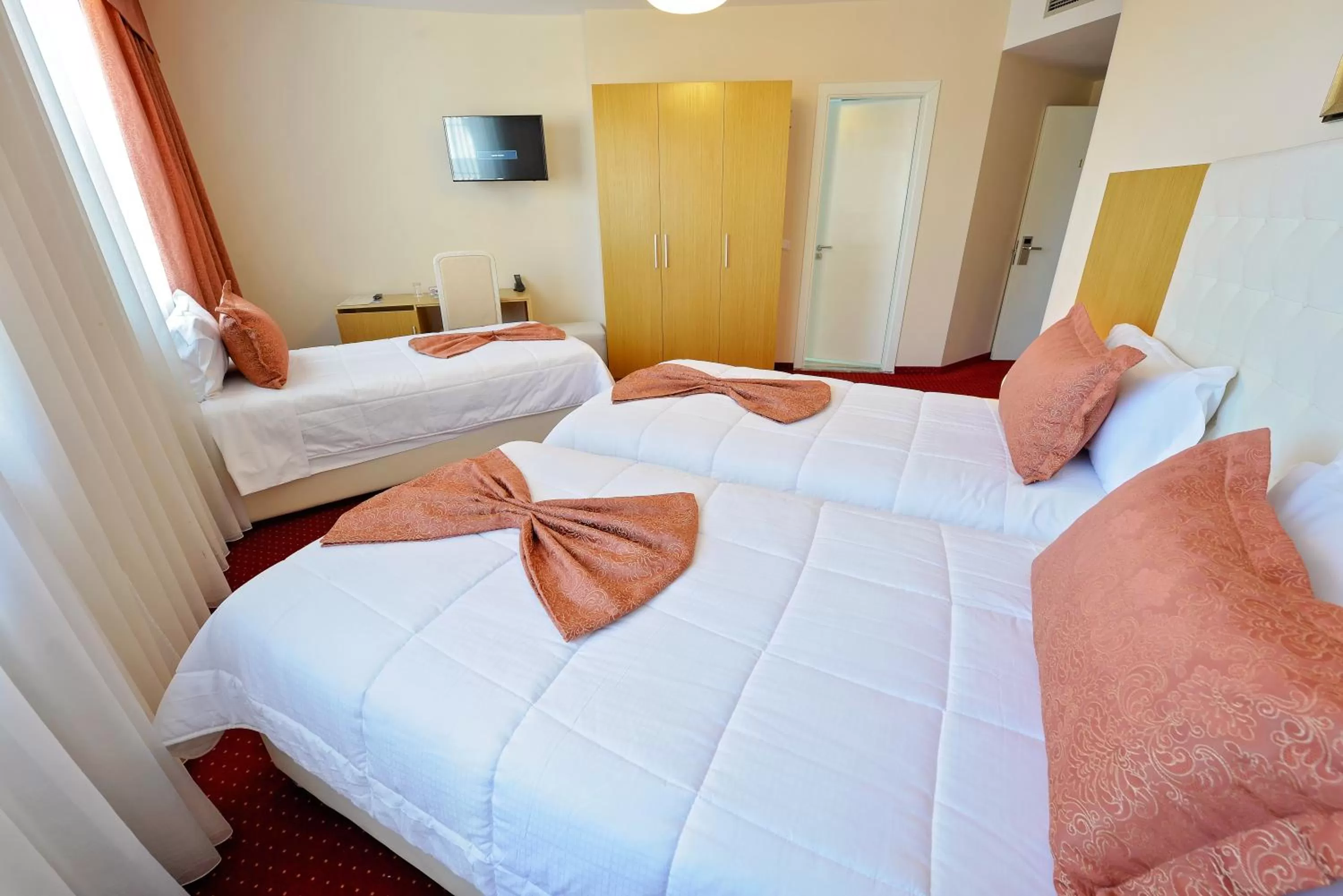 Bed in Jolly Hotel