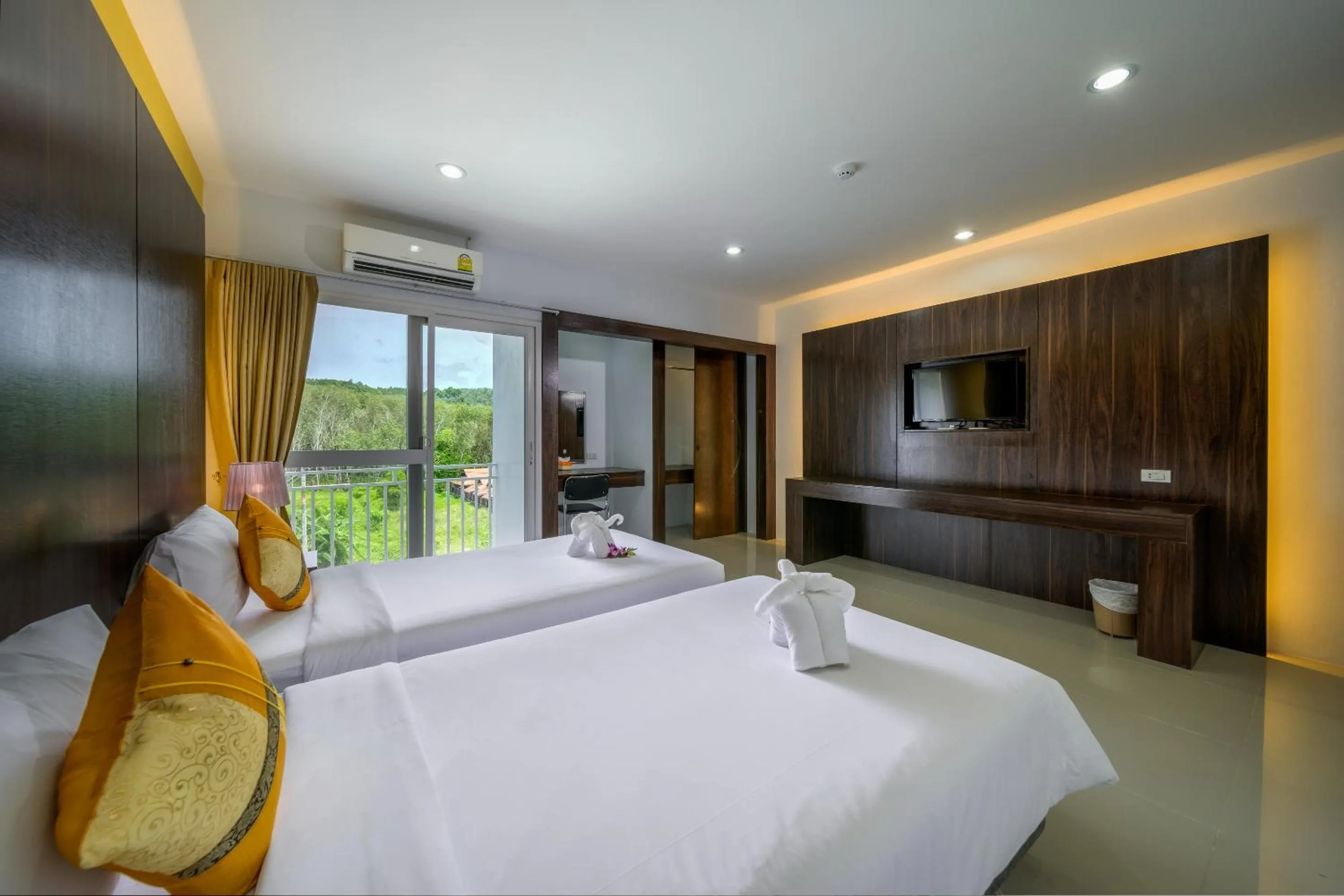 Photo of the whole room, Bed in Naiyang Place - Phuket Airport