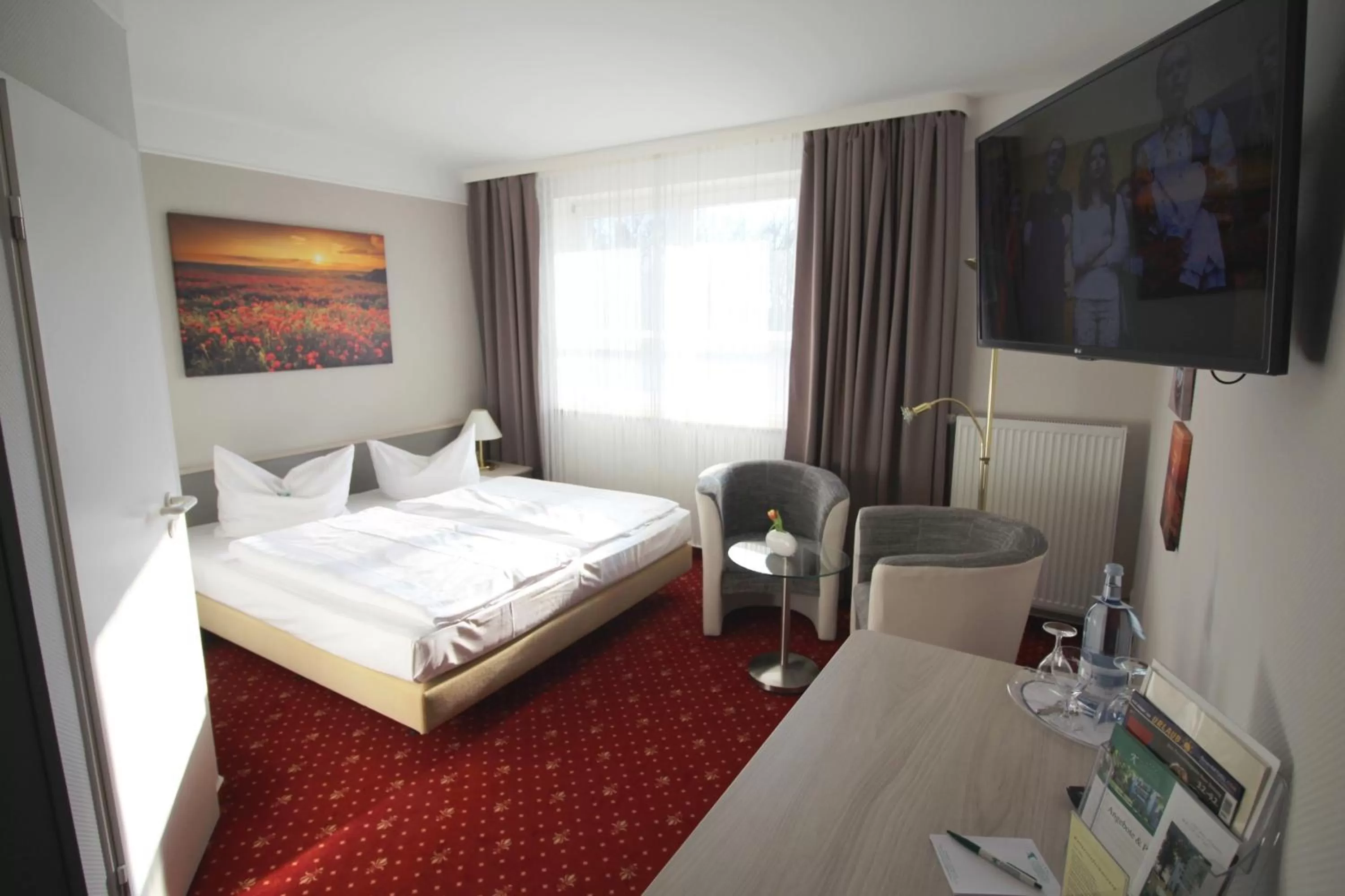 Photo of the whole room, Bed in Parkhotel Klüschenberg