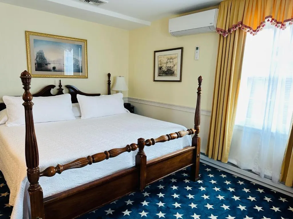 Bed in America's Cup Inn Newport