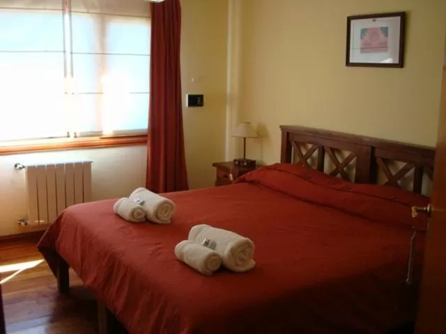 Bed in Hosteria Miyazato Inn