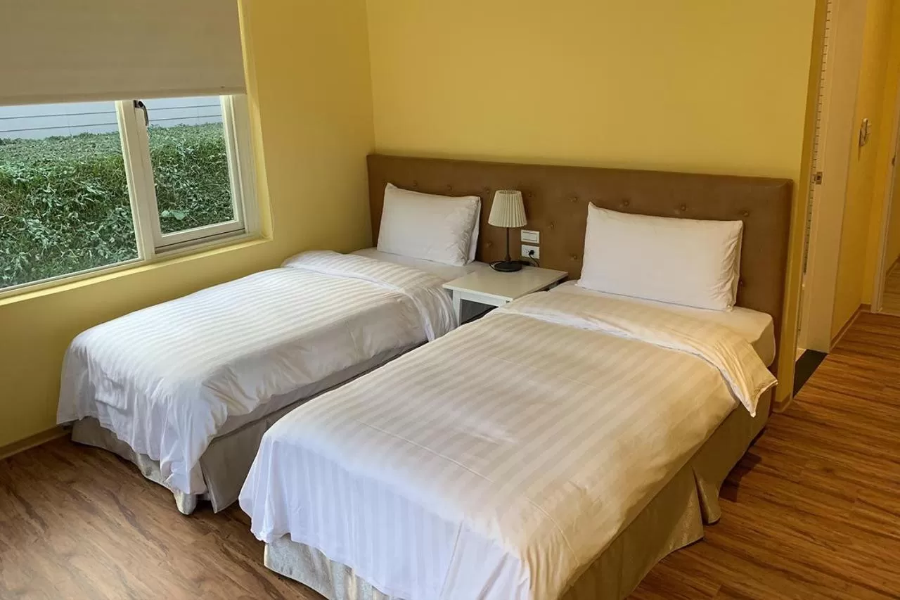 Bed in American Village Resort