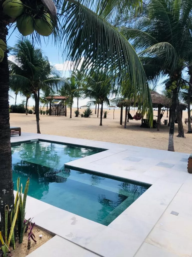 Swimming Pool in Pousada Recanto da Praia