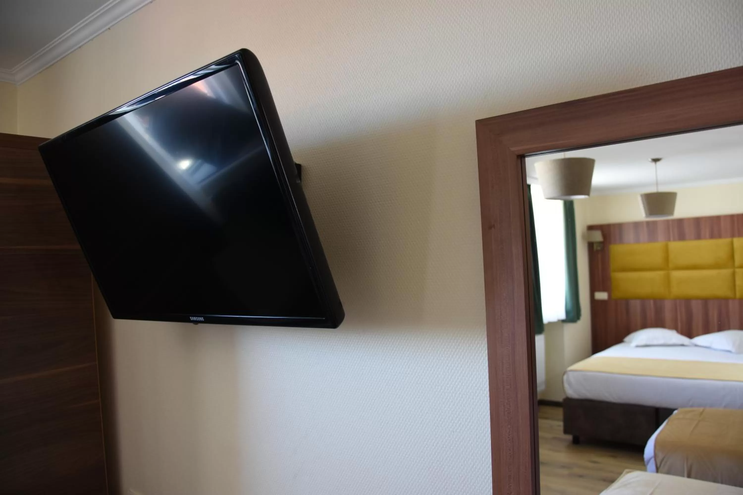 TV and multimedia, Bed in Sun Hotel