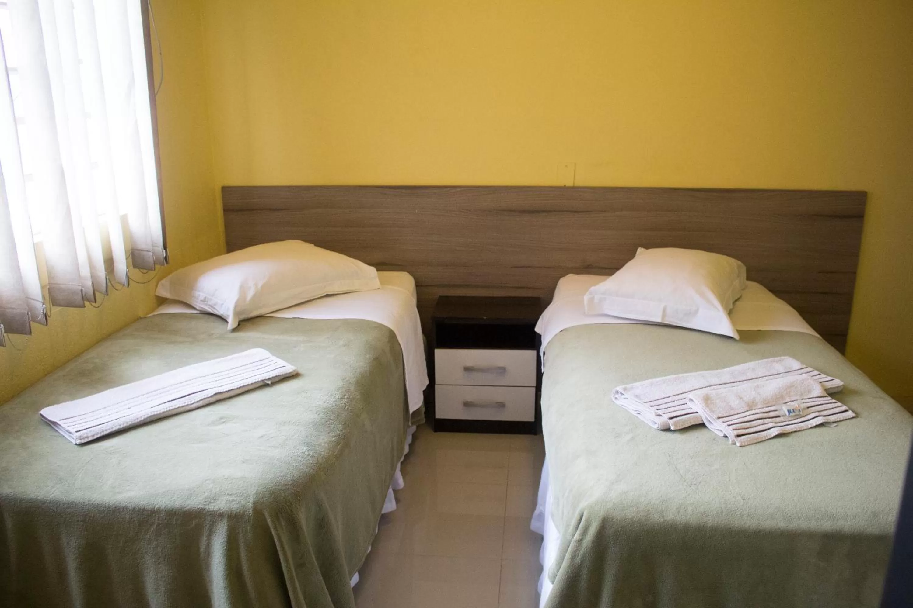 Bed in Hotel Dois Irmãos