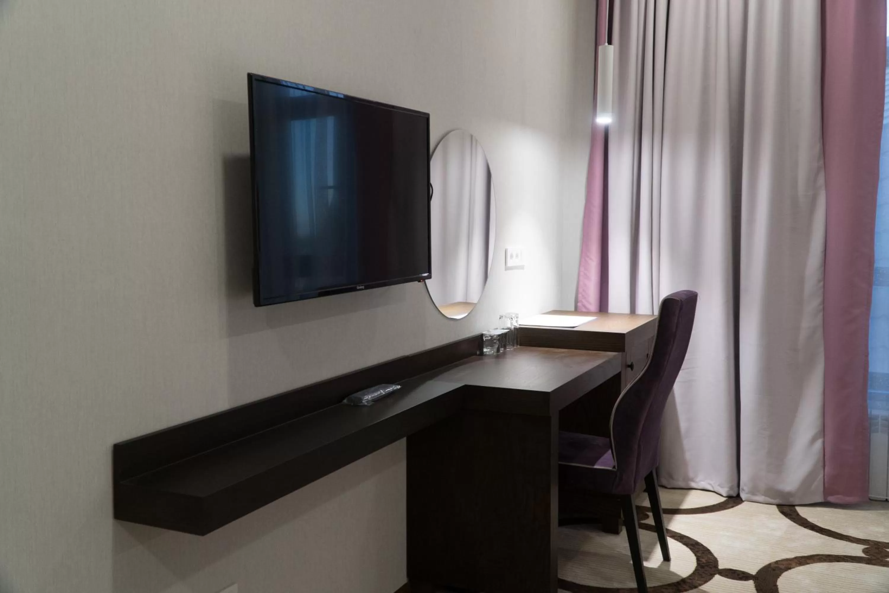 TV/Entertainment Center in East Palace Hotel