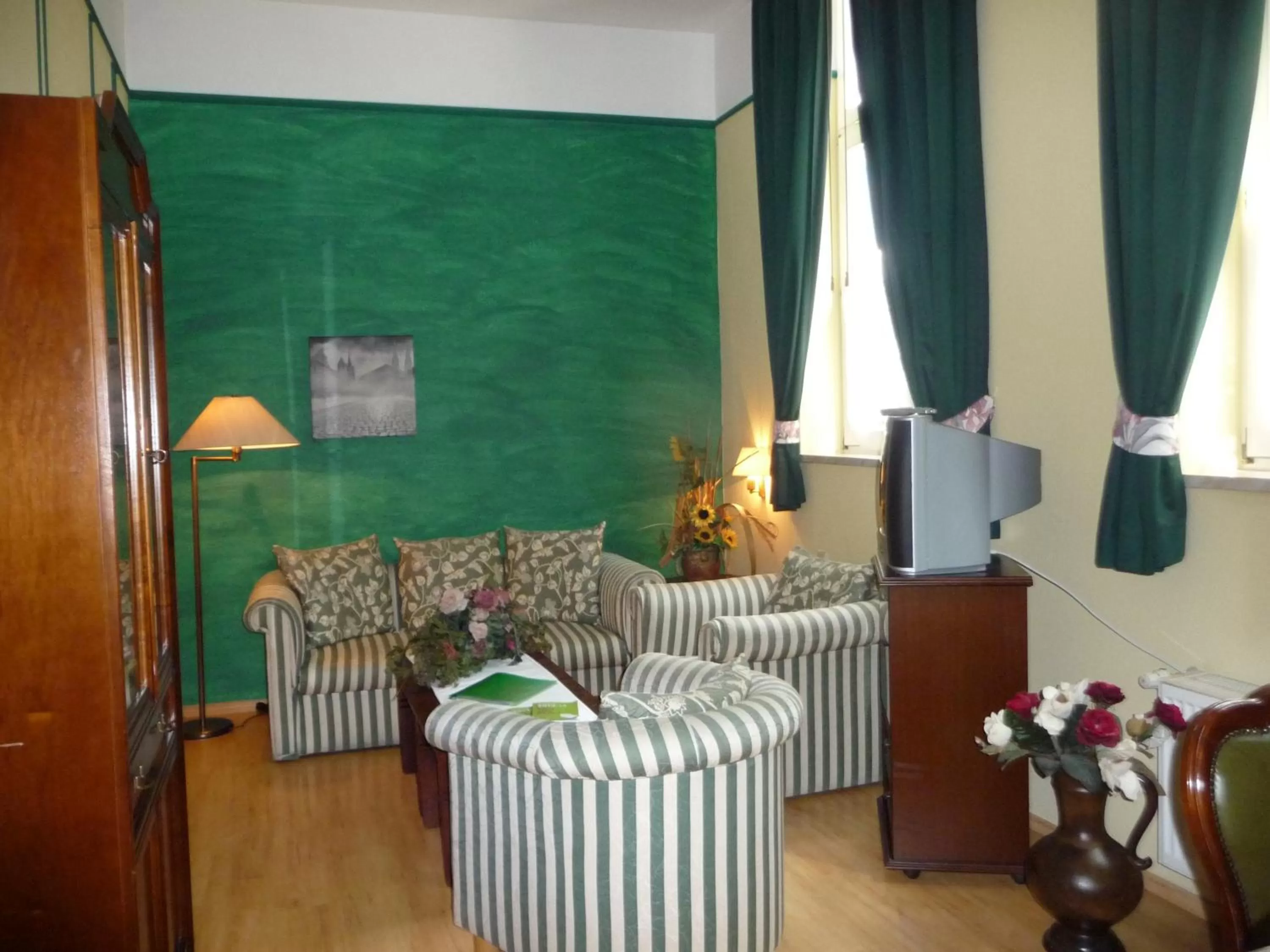 Communal lounge/ TV room in Hotel Am Grudenberg