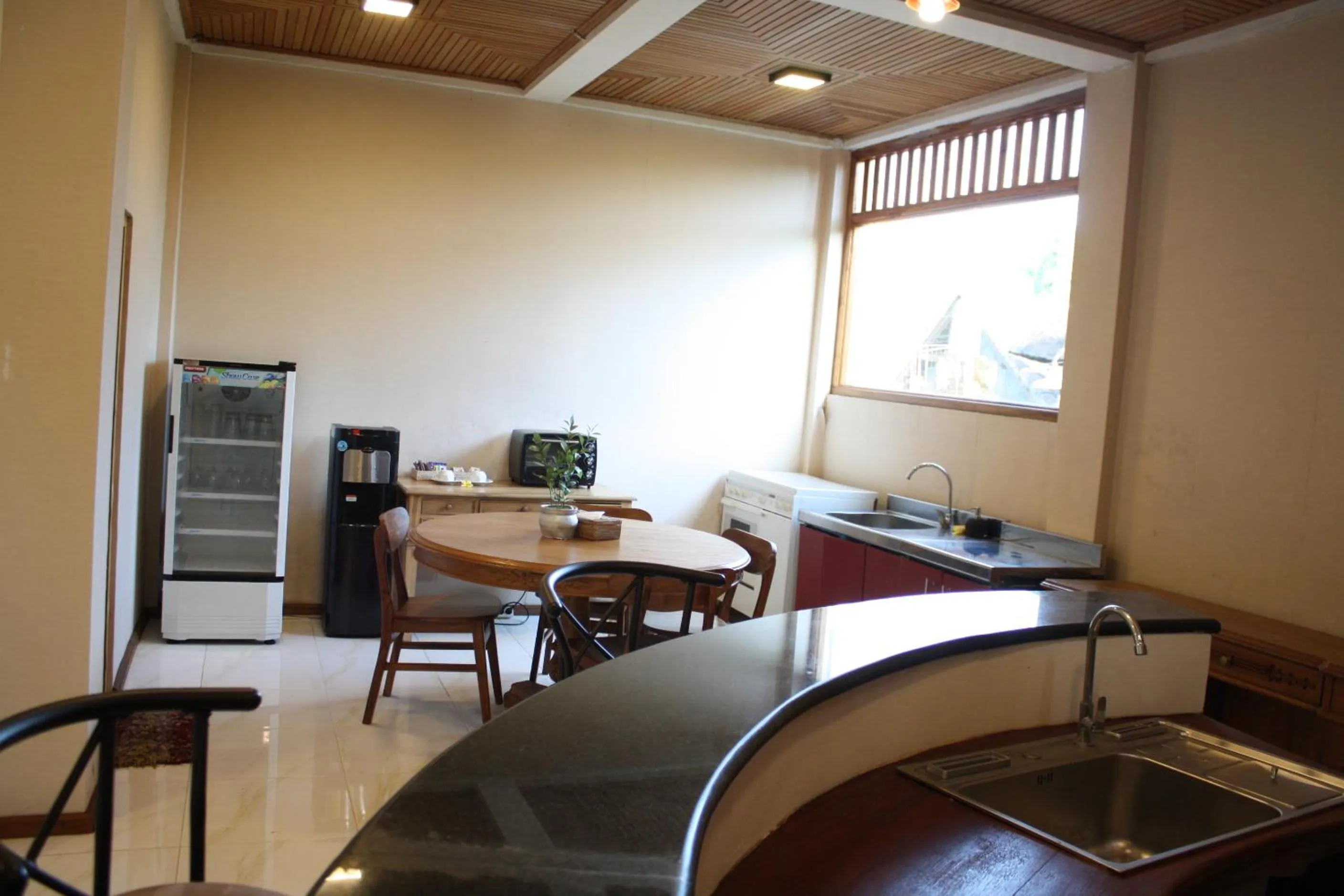 kitchen in Graha Sandat Villas by GenuineHost