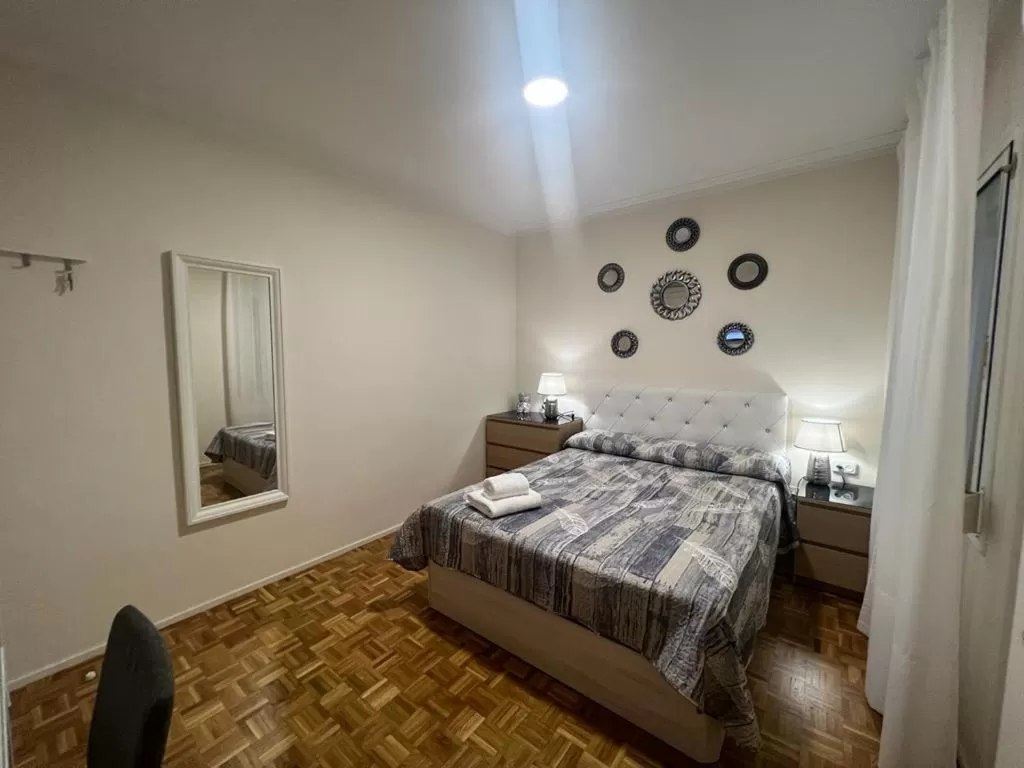 Bed in Villarroel habitaciones