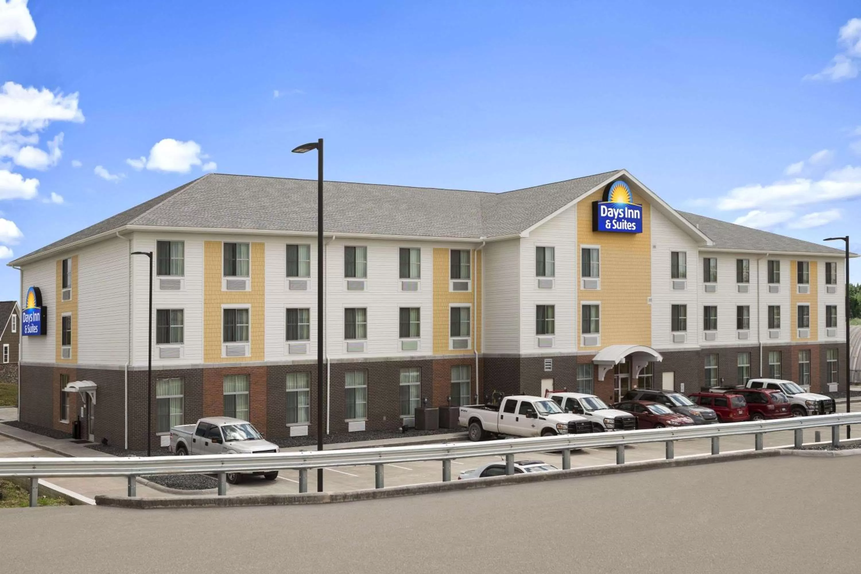 Property building in Days Inn & Suites by Wyndham Belmont