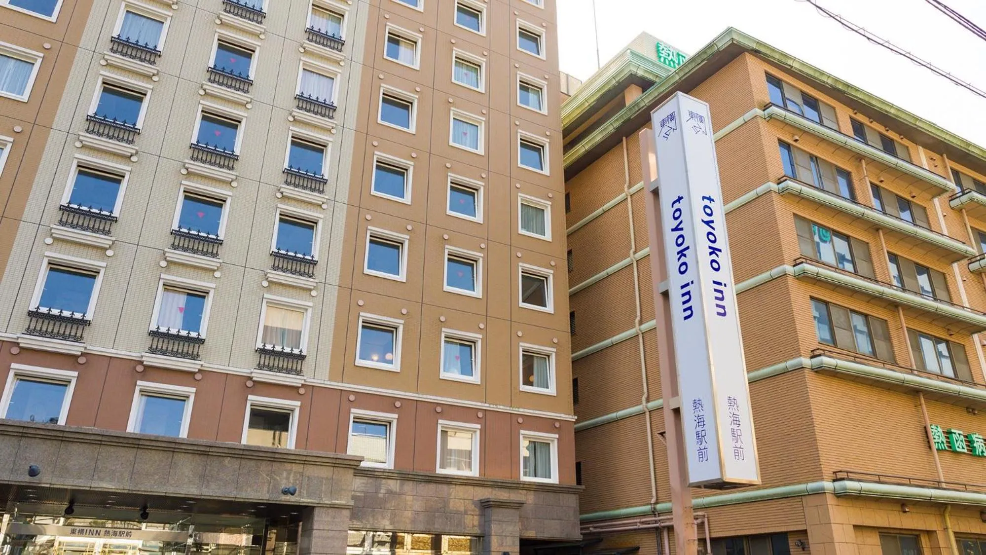 Property logo or sign in Toyoko Inn Atami Ekimae