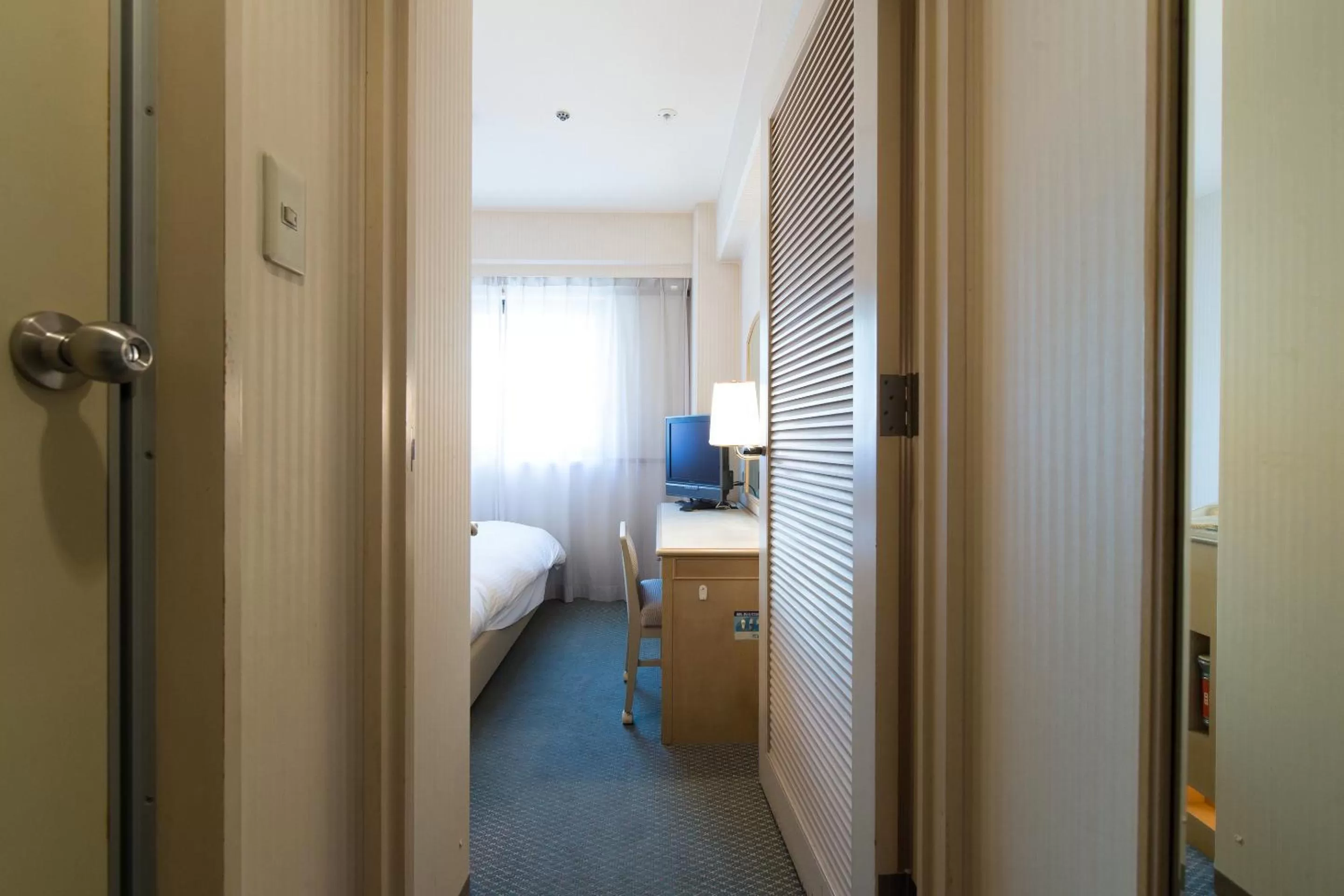 Photo of the whole room, Bed in Tabist Hotel Tetora Kitakyushu