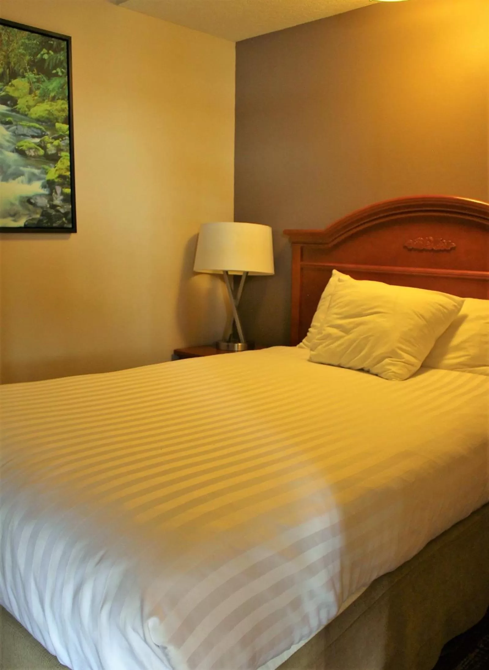 Bed in Ramada by Wyndham Campbell River