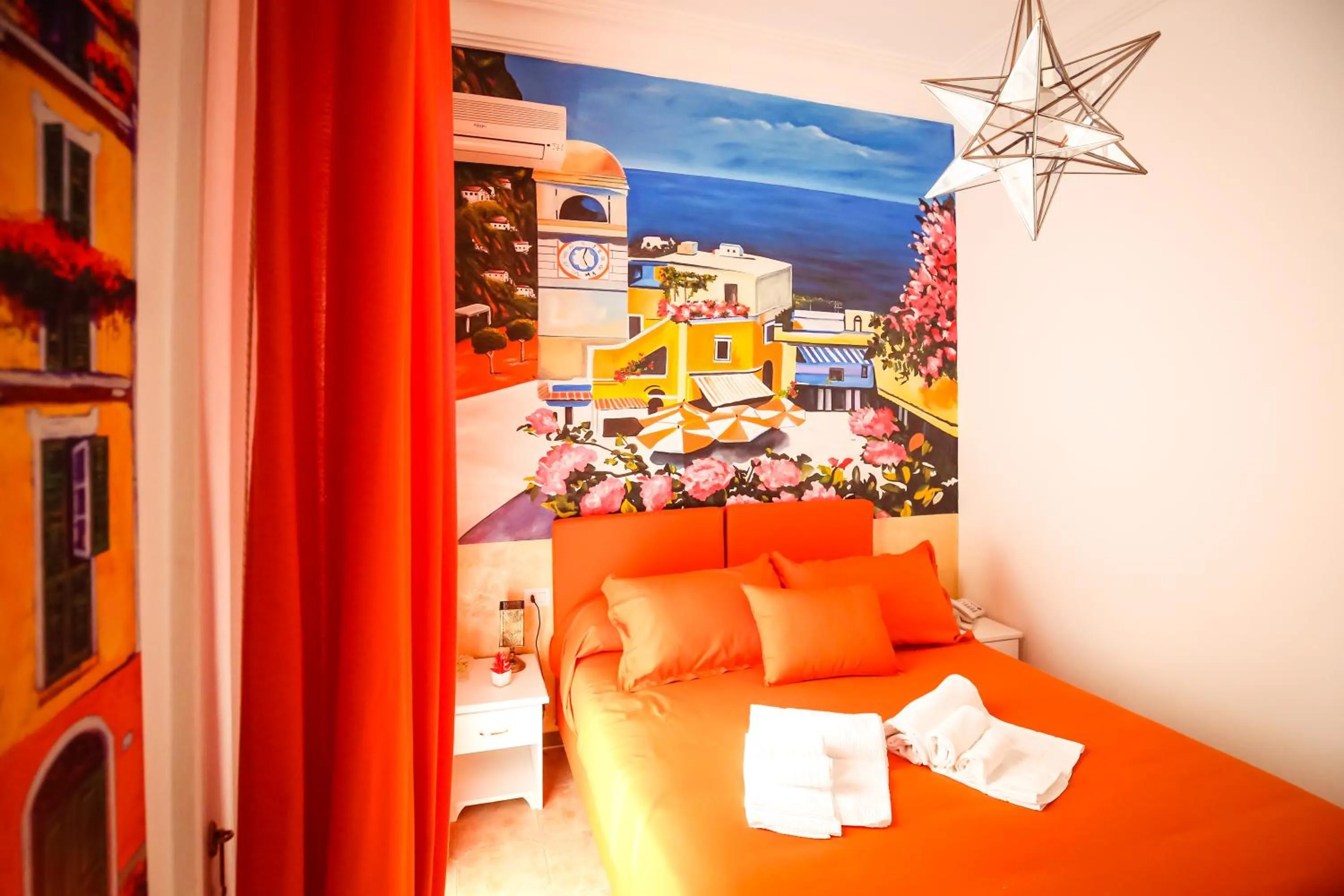 Bed in NapoliMia Boutique Hotel