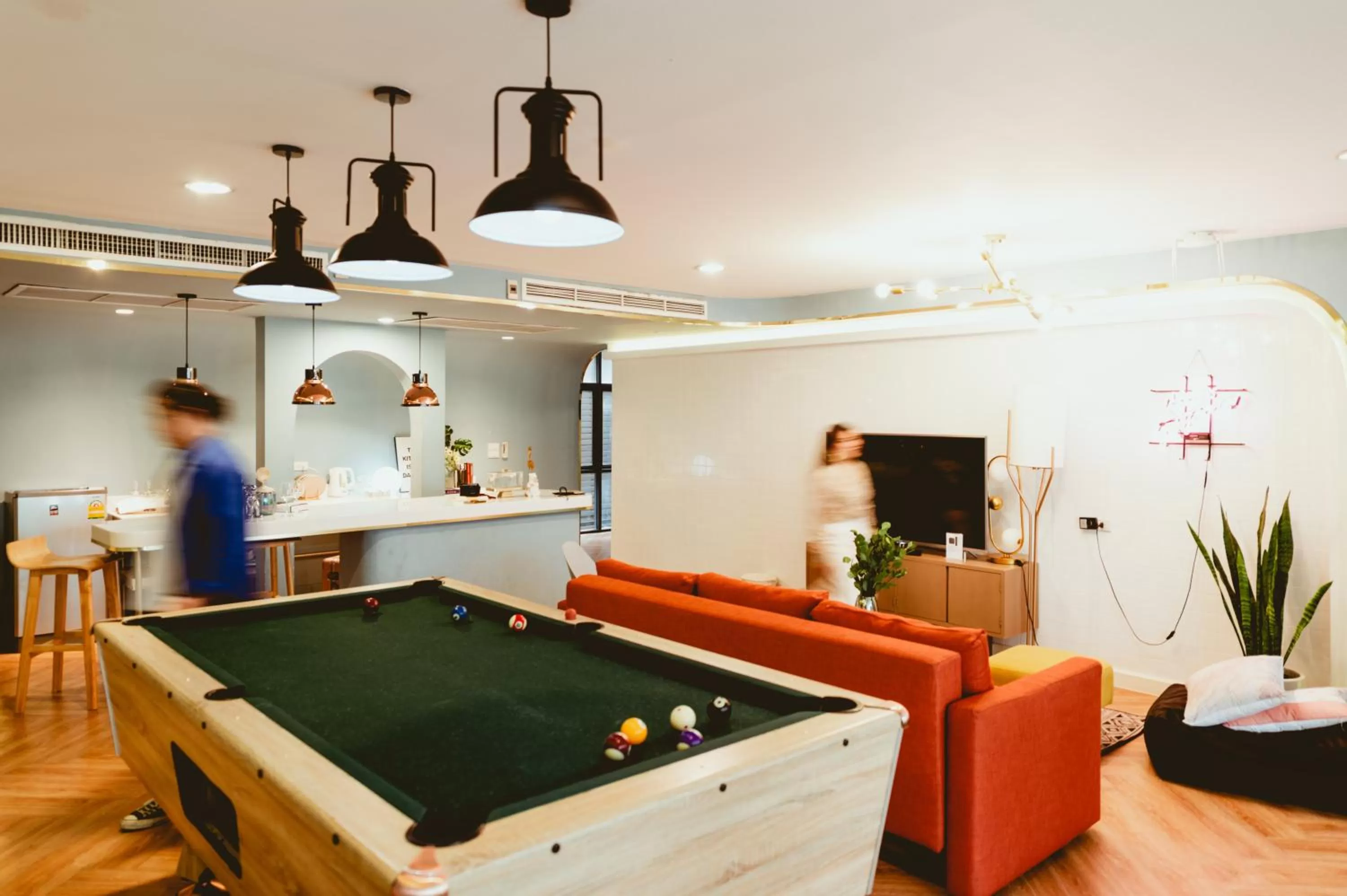 Living room, Billiards in Nimit Boutique Hotel