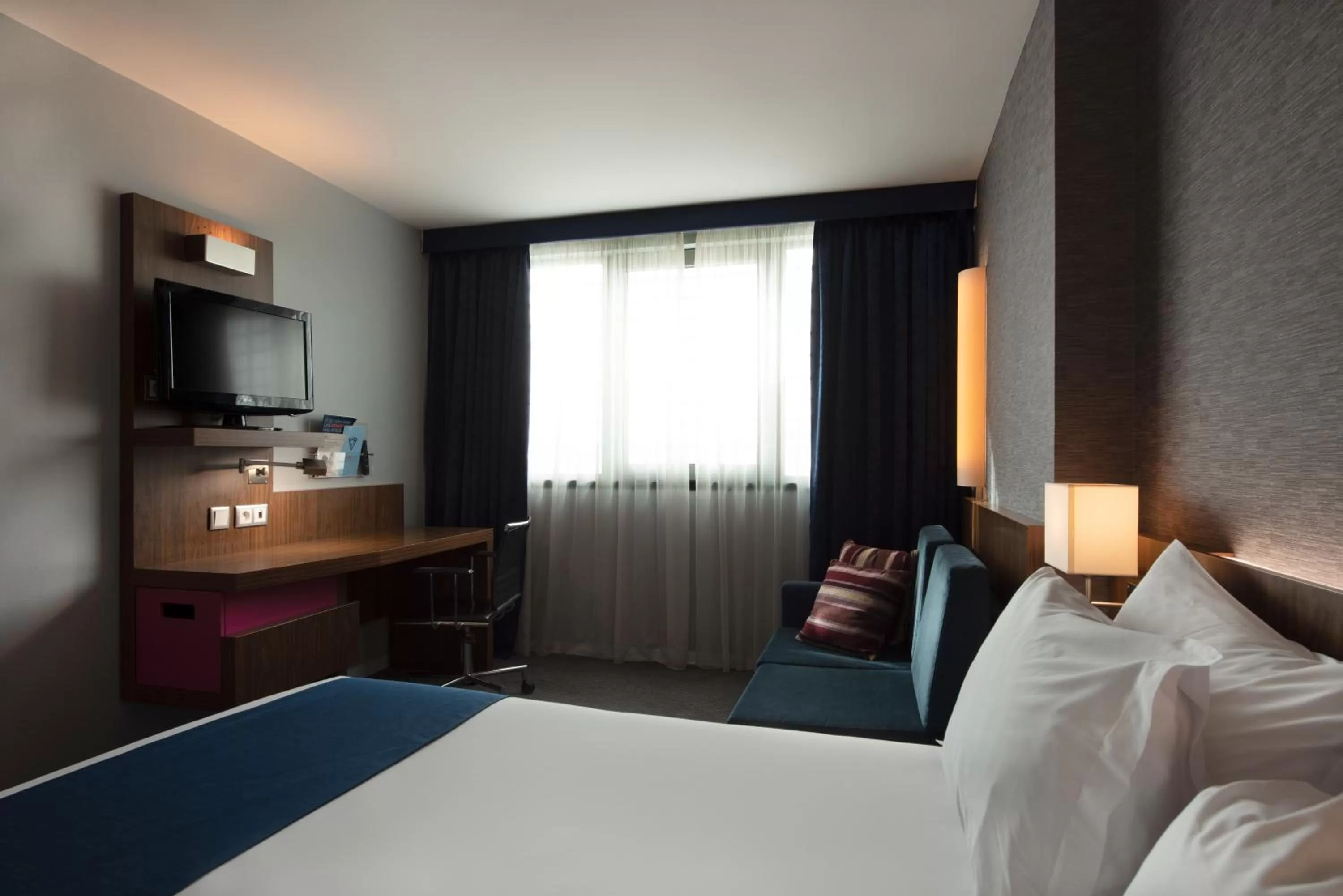 Photo of the whole room, Bed in Holiday Inn Express Lisbon Airport by IHG