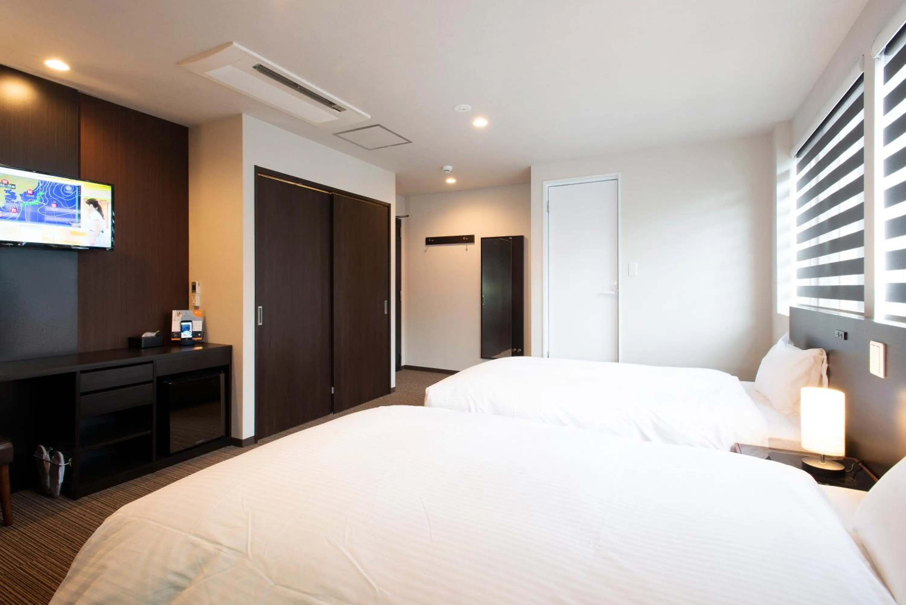 Communal lounge/ TV room, Bed in Hotel Kojan