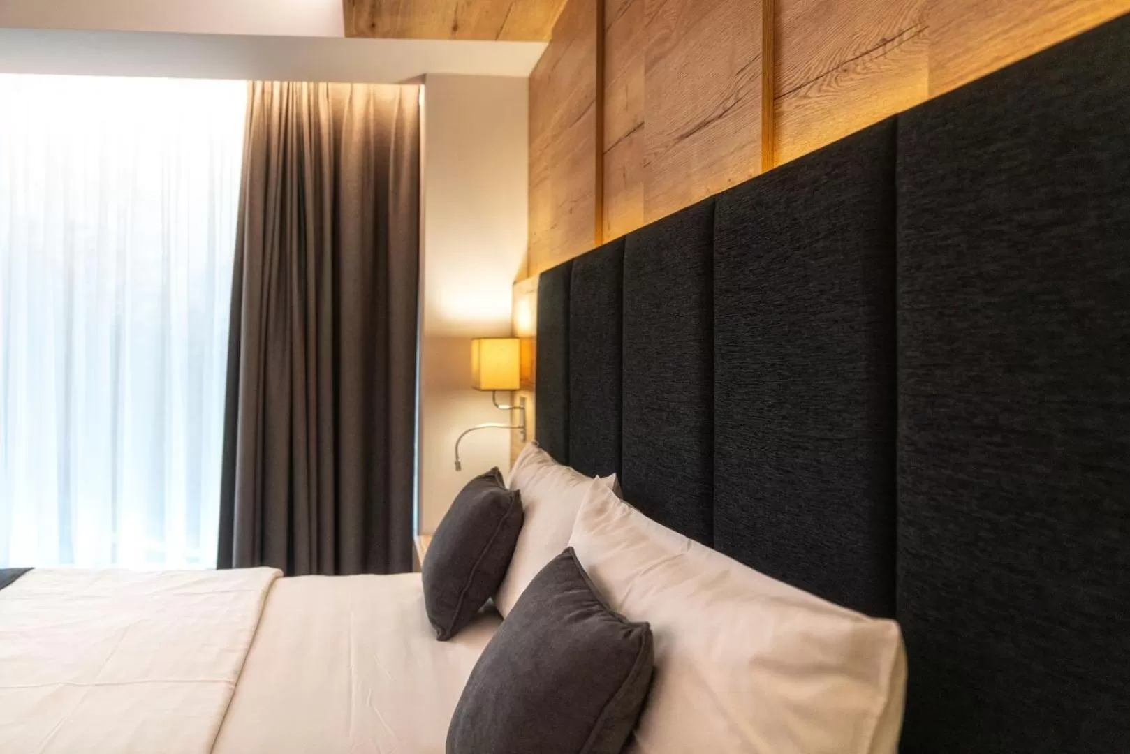 Bed in Hotel META Resort & Vine SPA