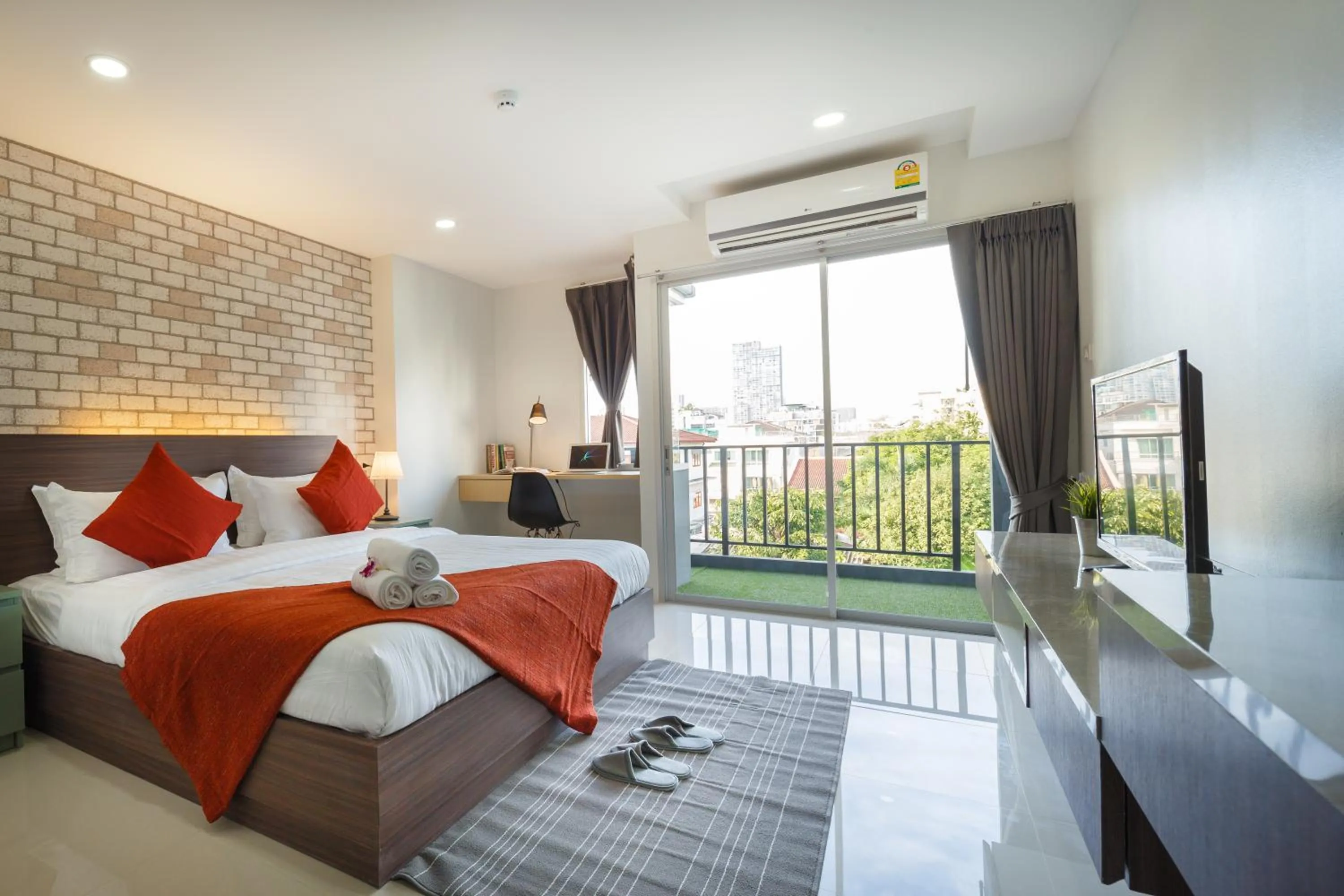 Bed in Q Space Residence