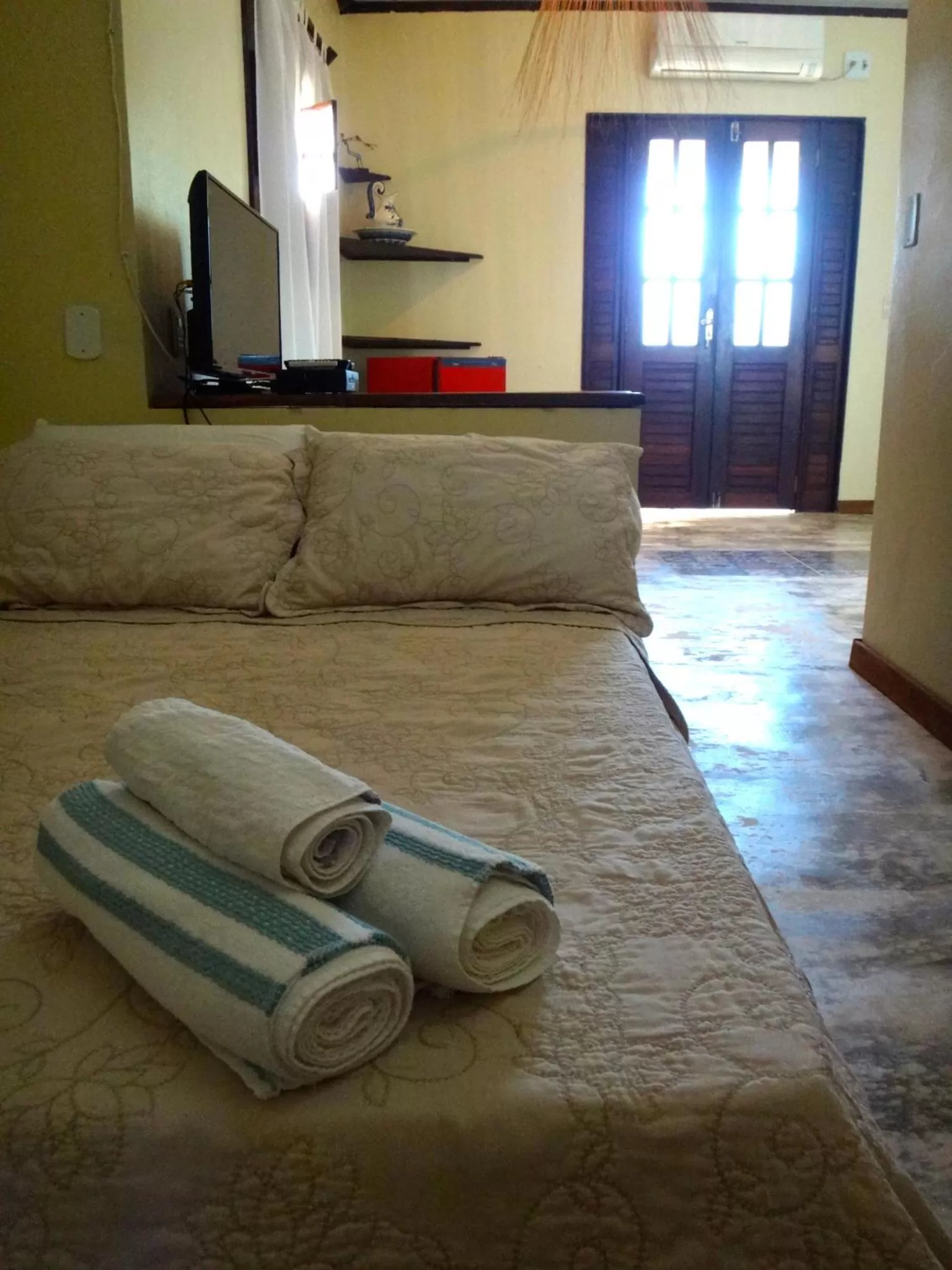 Bed, Seating Area in Pousada do Sonho