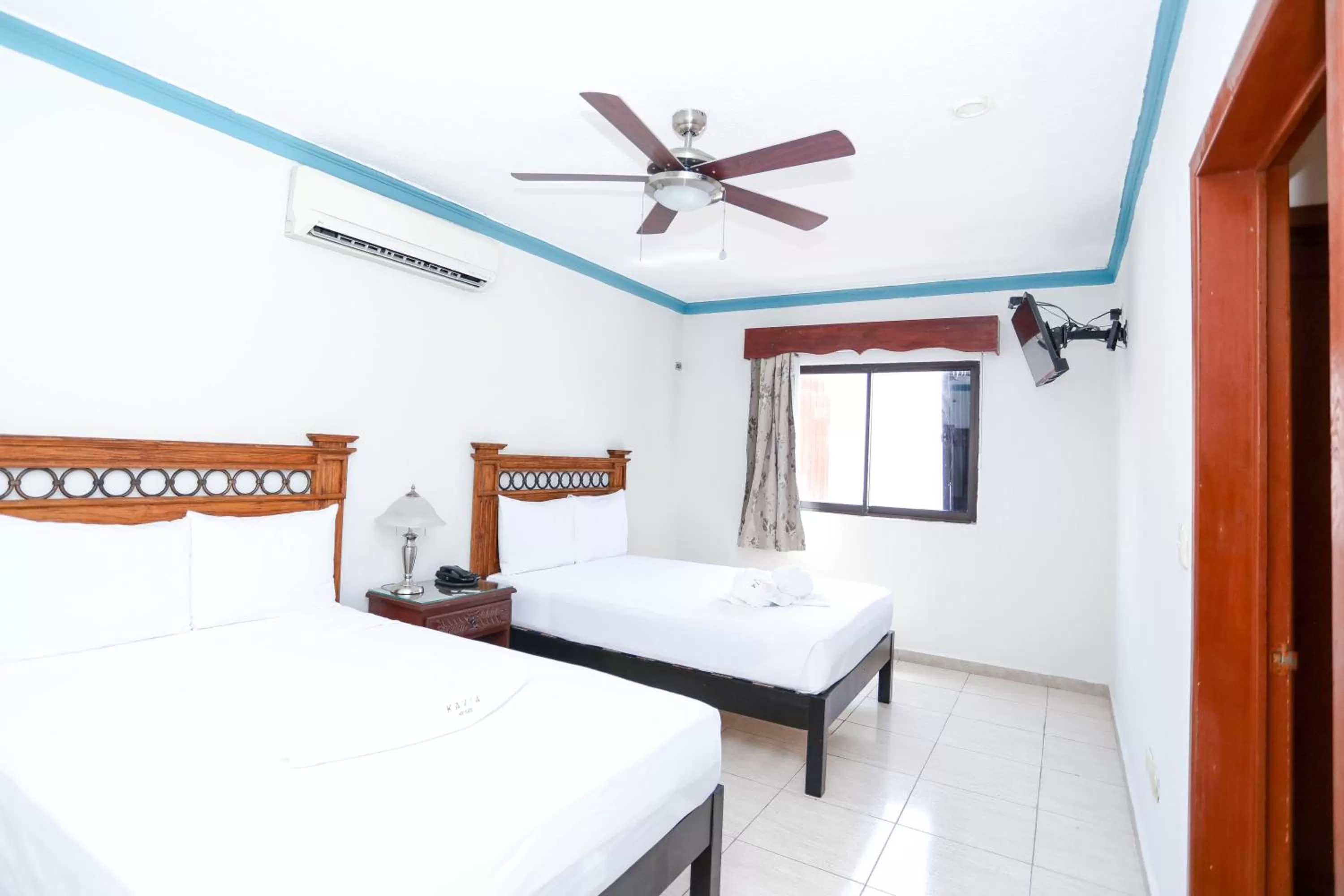 Bed in Hotel Avenida Cancun