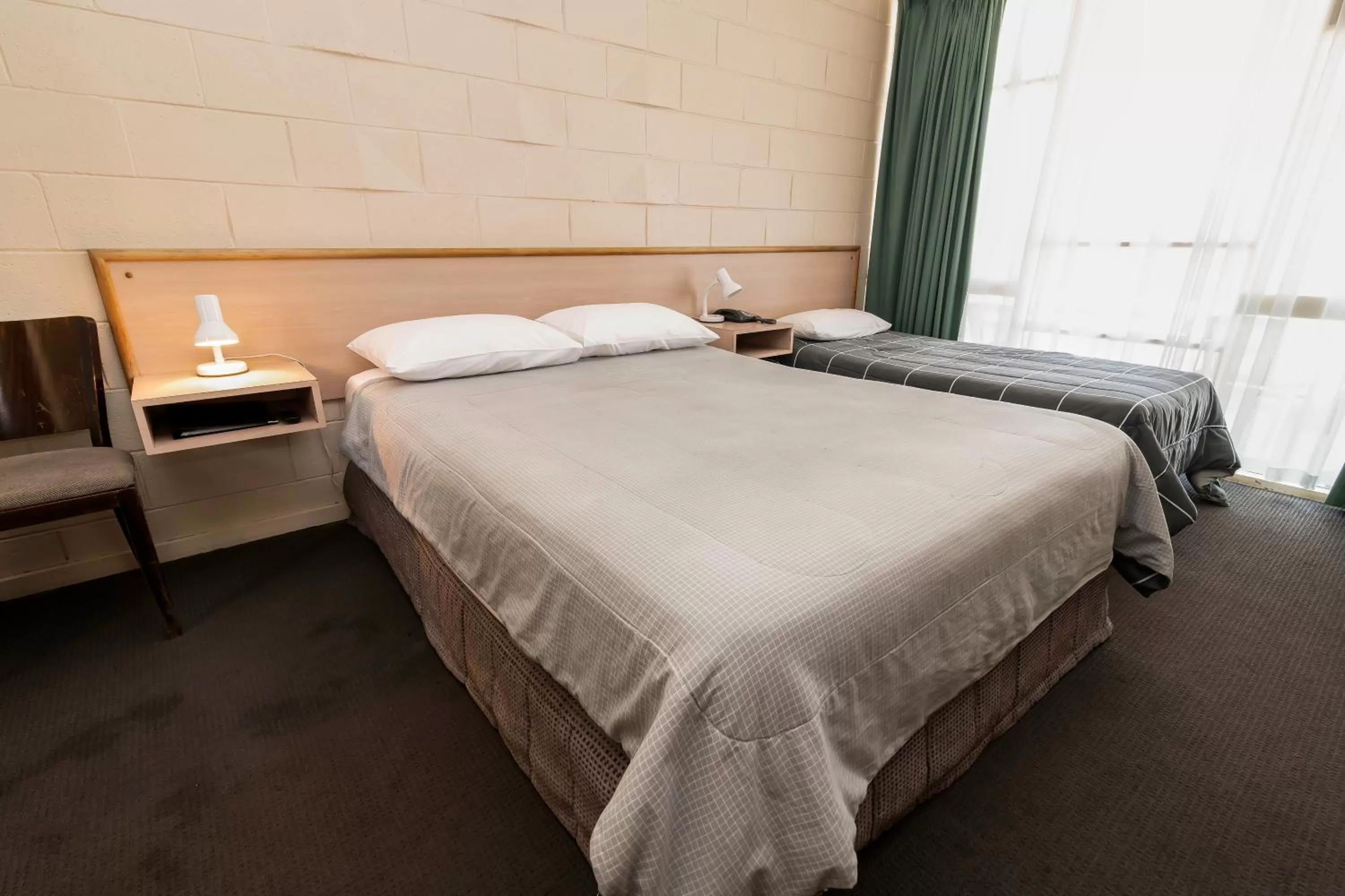 Bed in The Prince Mark Motel