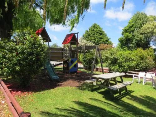 Children play ground in Camellia Court Family Motel