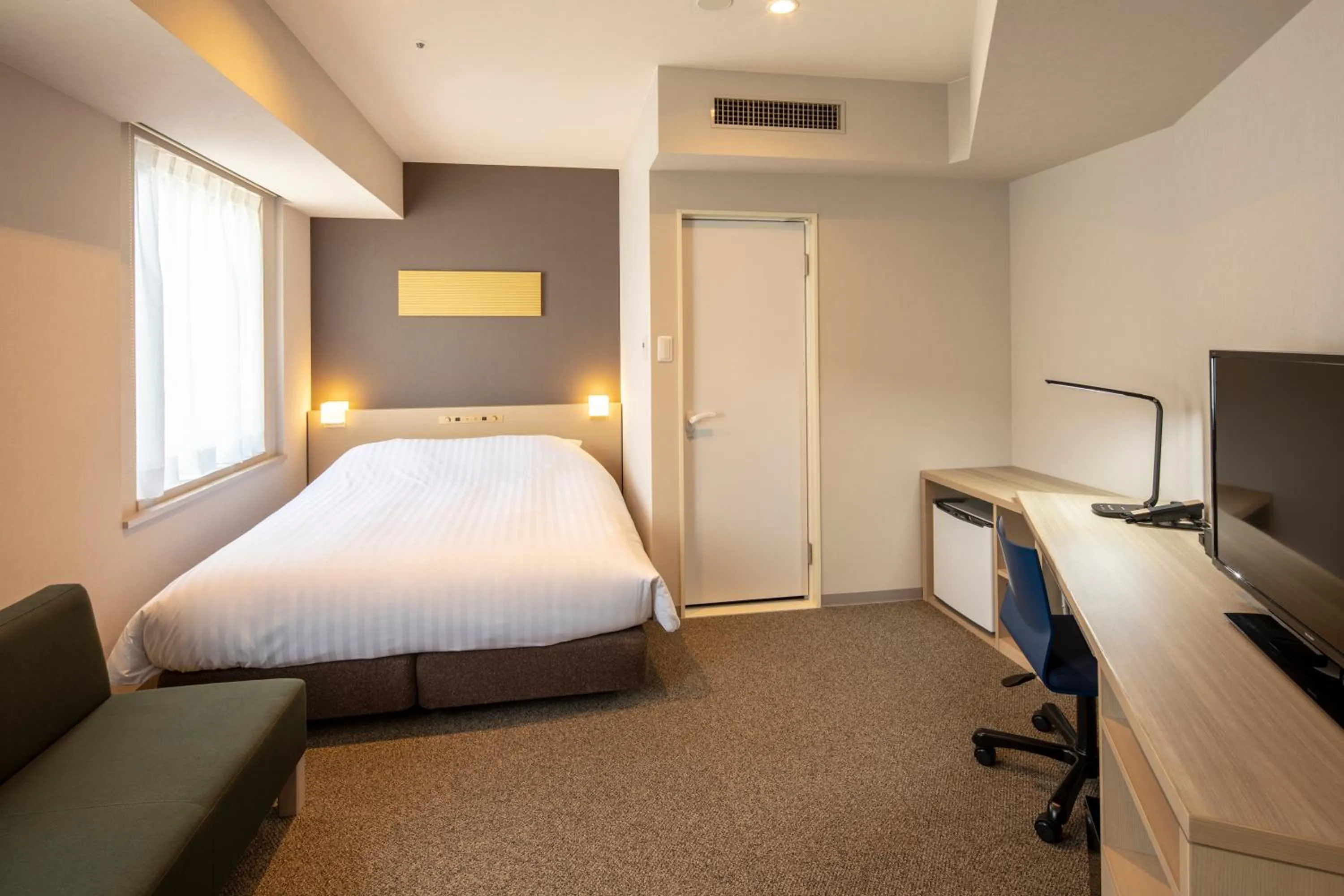 Photo of the whole room, Bed in JR Clement Inn Takamatsu