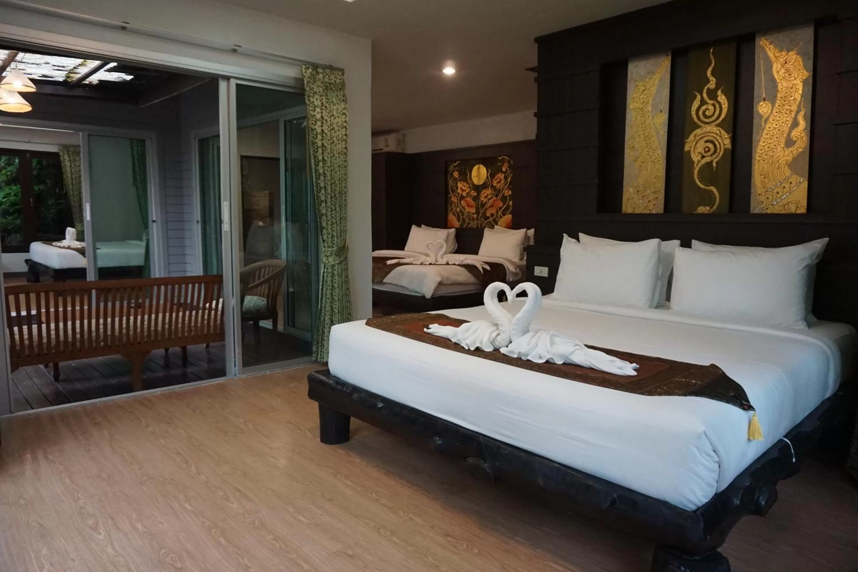 Bed in Rock and Tree House Resort