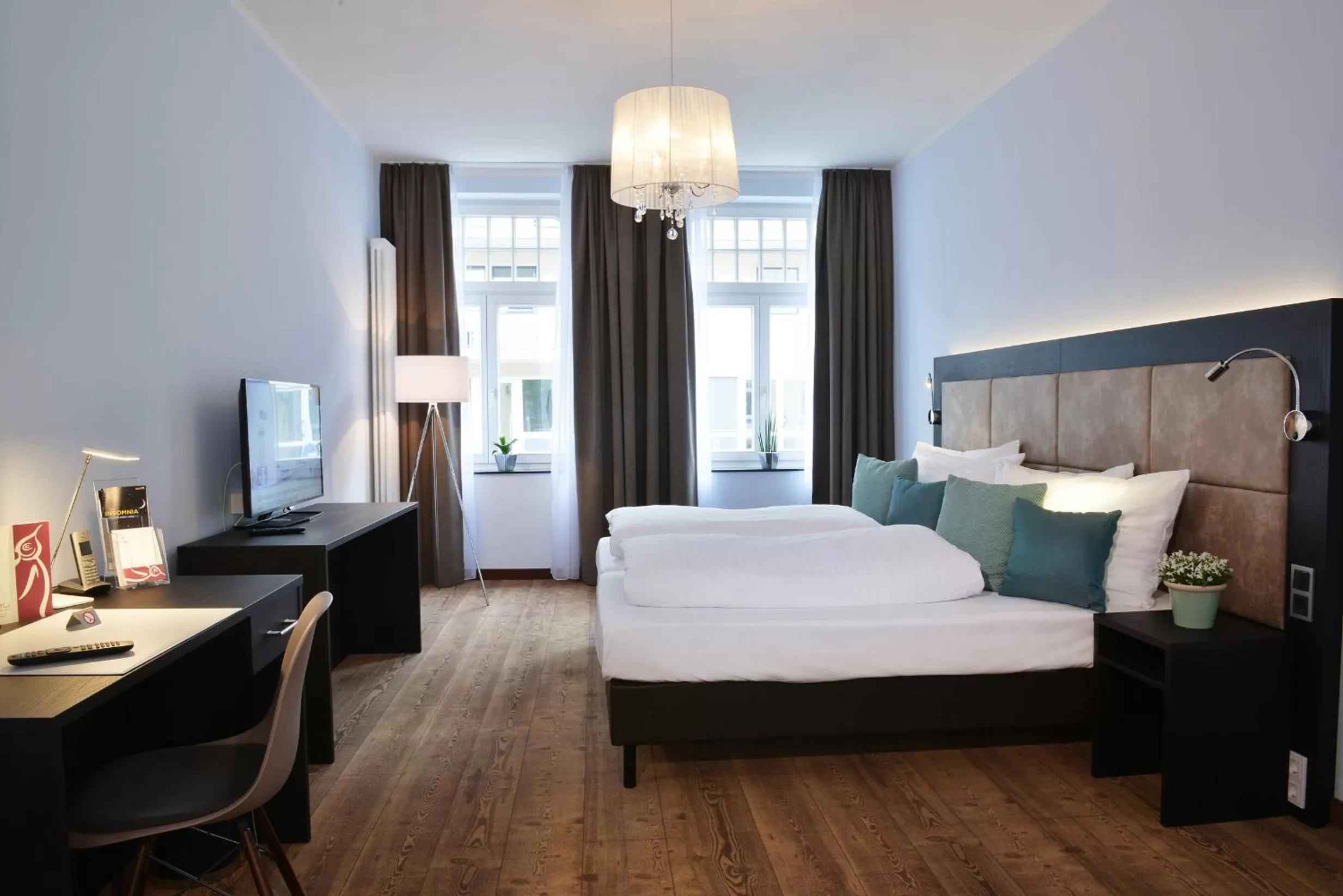 Photo of the whole room, Bed in UHU Gästehaus Superior