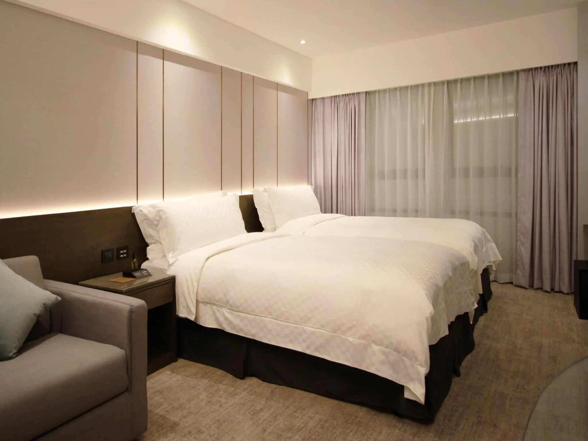 Bed in The Tango Hotel Taipei Linsen