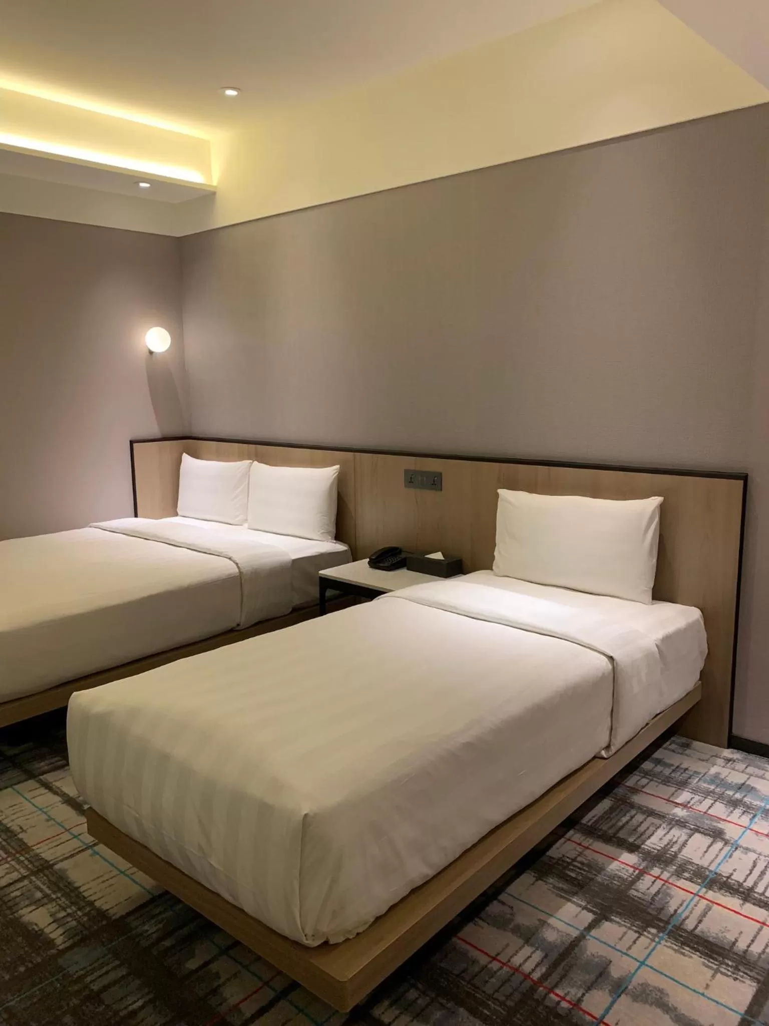 Bed in Hotel Midtown Richardson