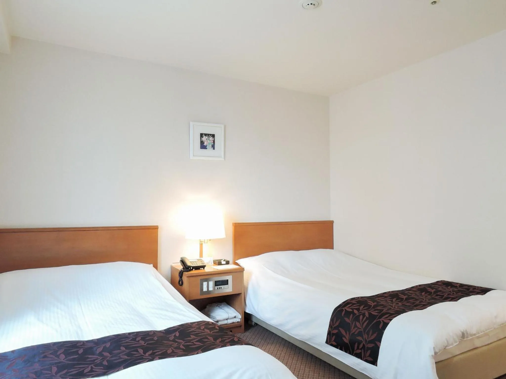 Photo of the whole room, Bed in Kobe City Gardens Hotel (Formally Hotel Kobe Shishuen)