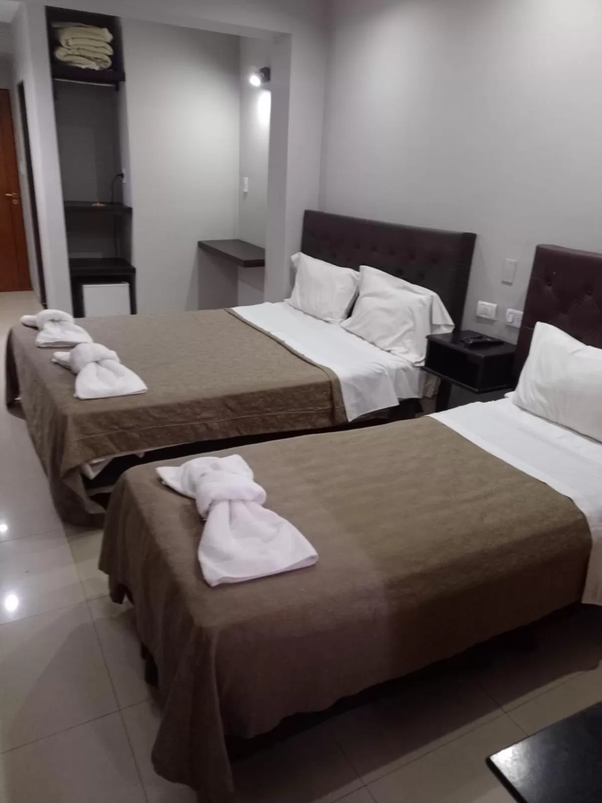 Bed in Lorenzo Suites Hotel
