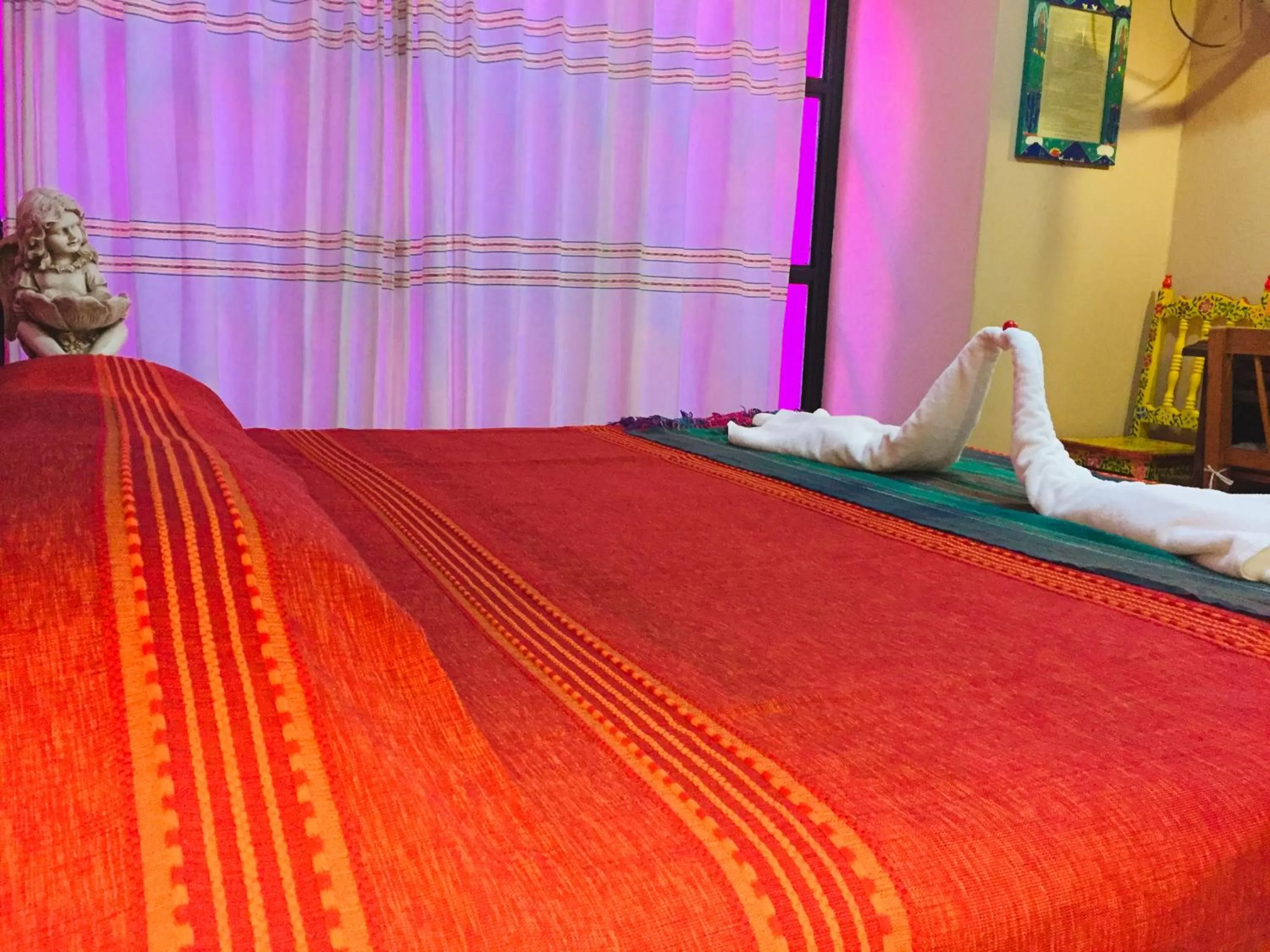 Bed in Hotel Cazomalli Oaxaca