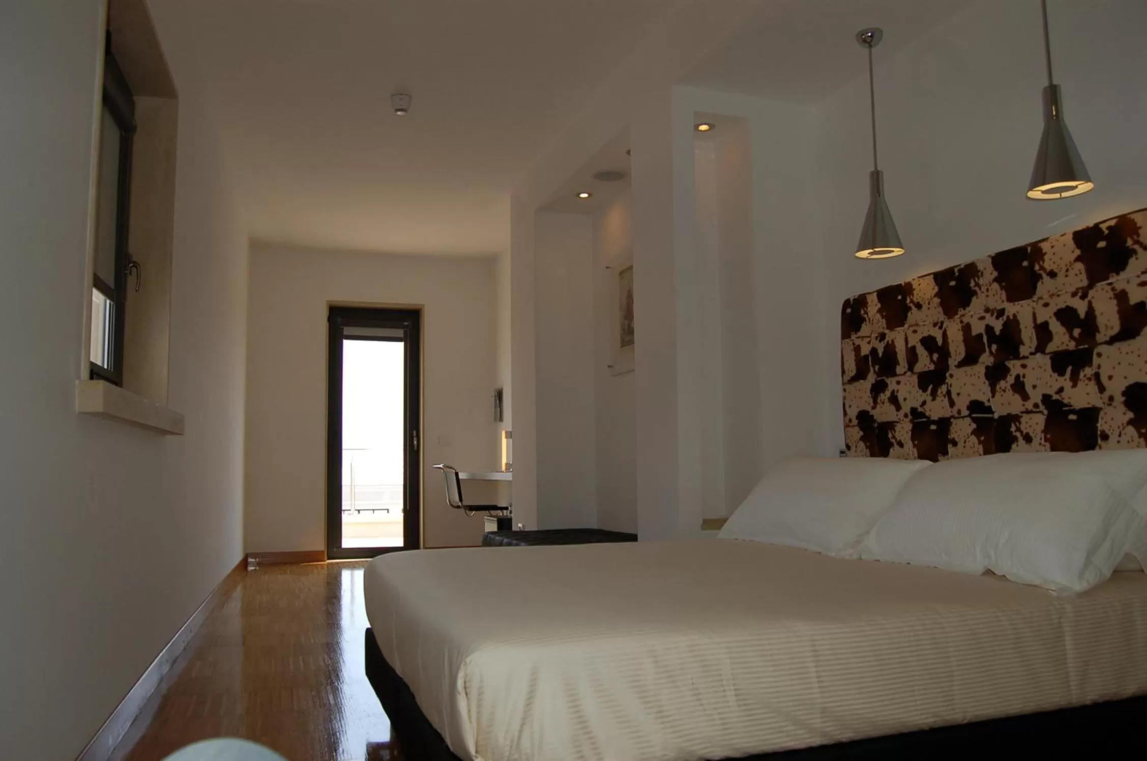 Decorative detail, Bed in Hotel Del Conte