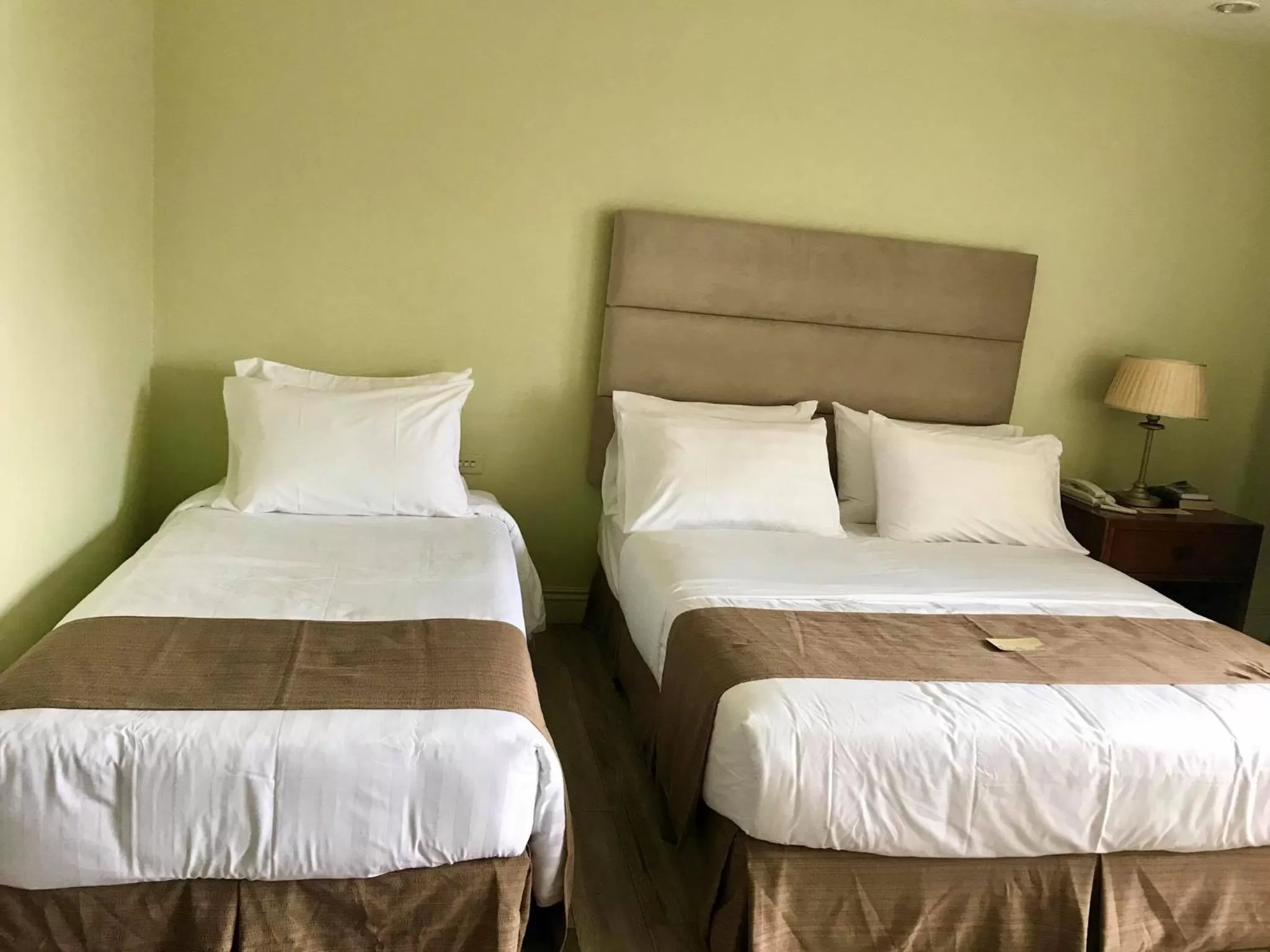 Bed in Skyland Garden Hotel and Resort