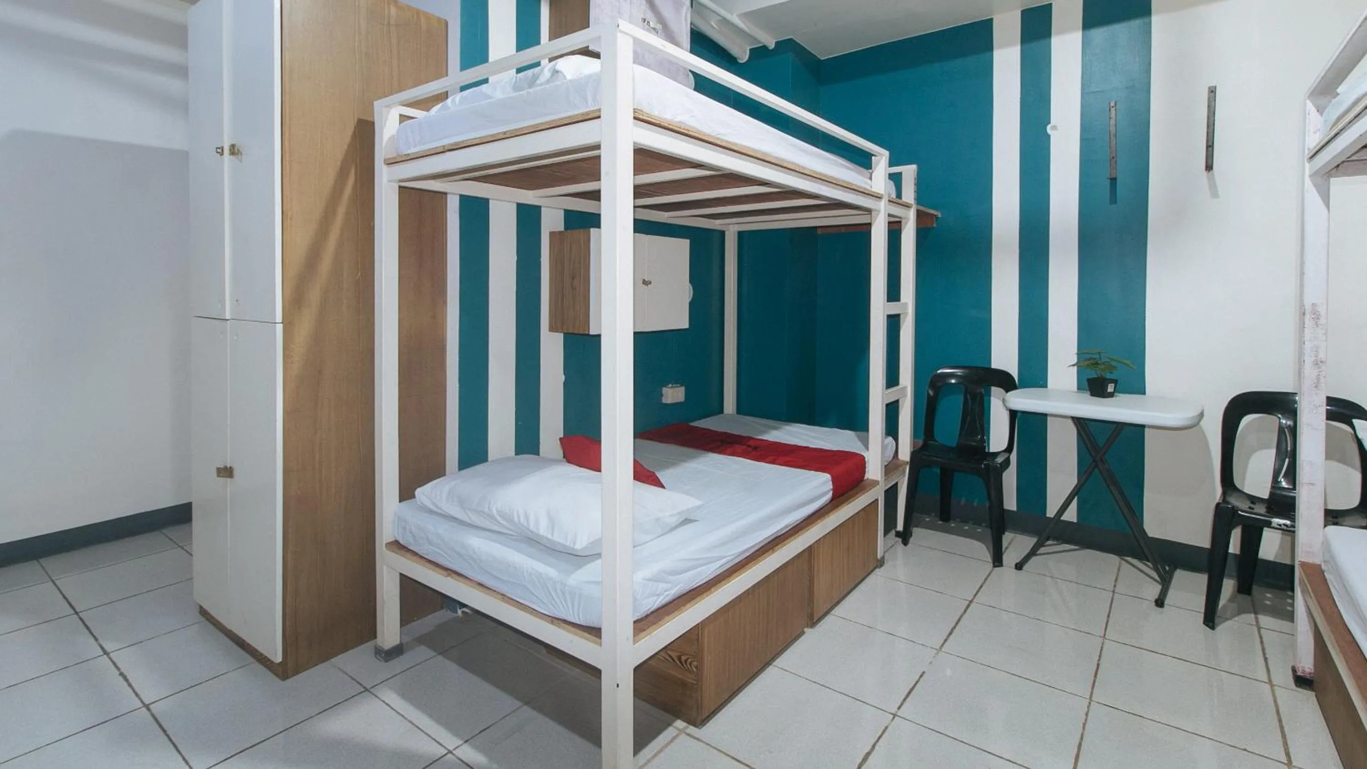 Photo of the whole room, Bed in RedDoorz at Crowne One Condo