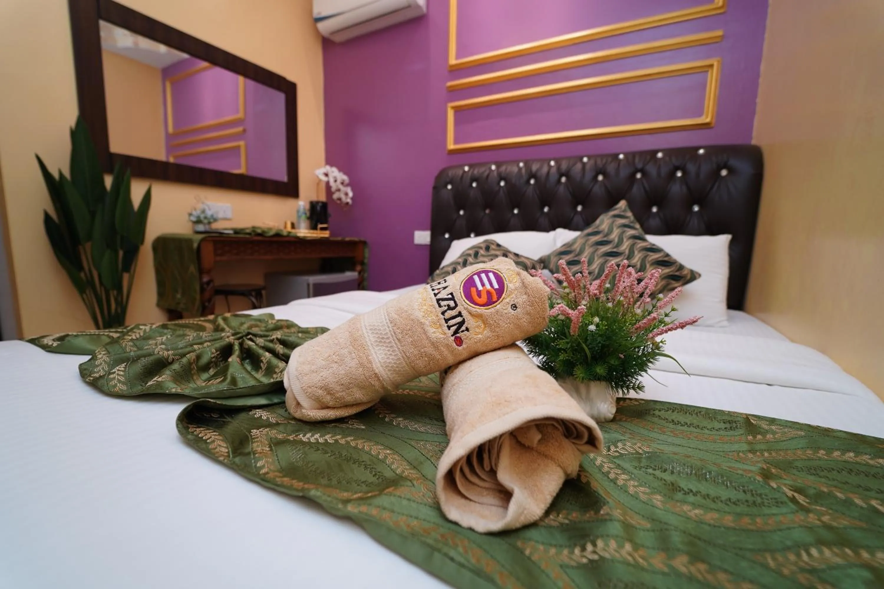 Bed in Ghazrin's Classic Hotel JB