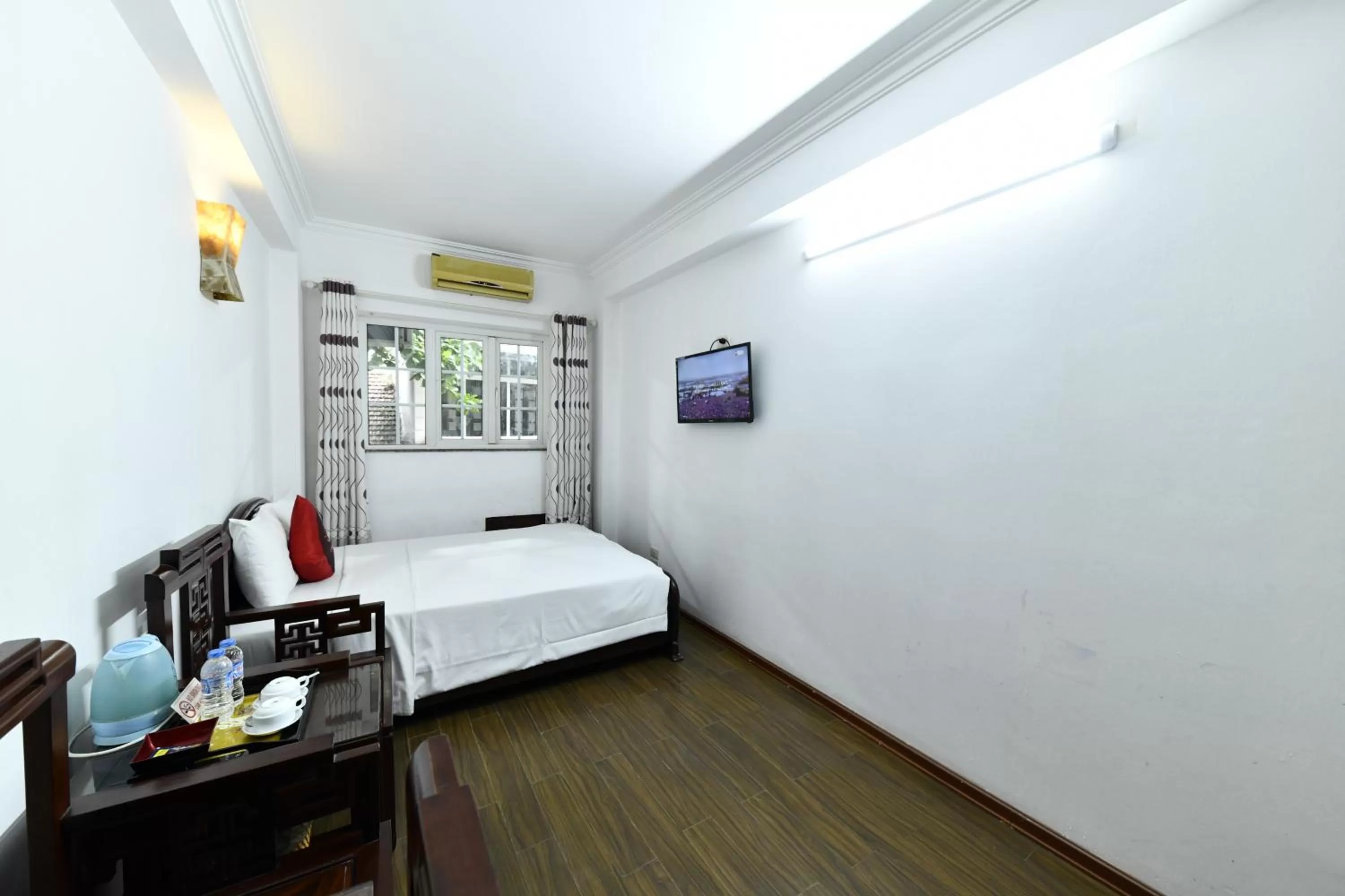 Bed in Phoenix Legend Hotel Hanoi