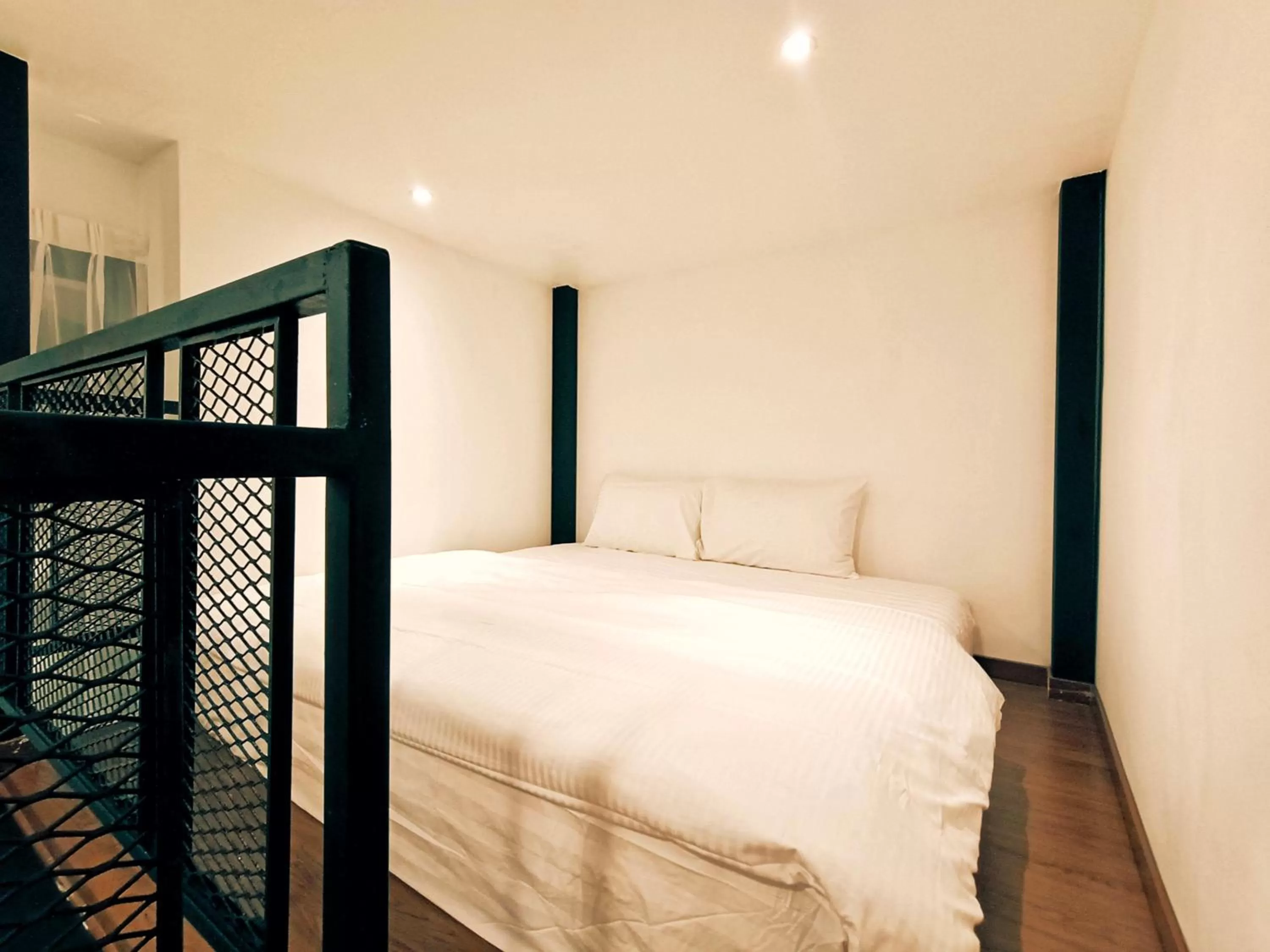 Bed in The Magazine Boutique Hotel