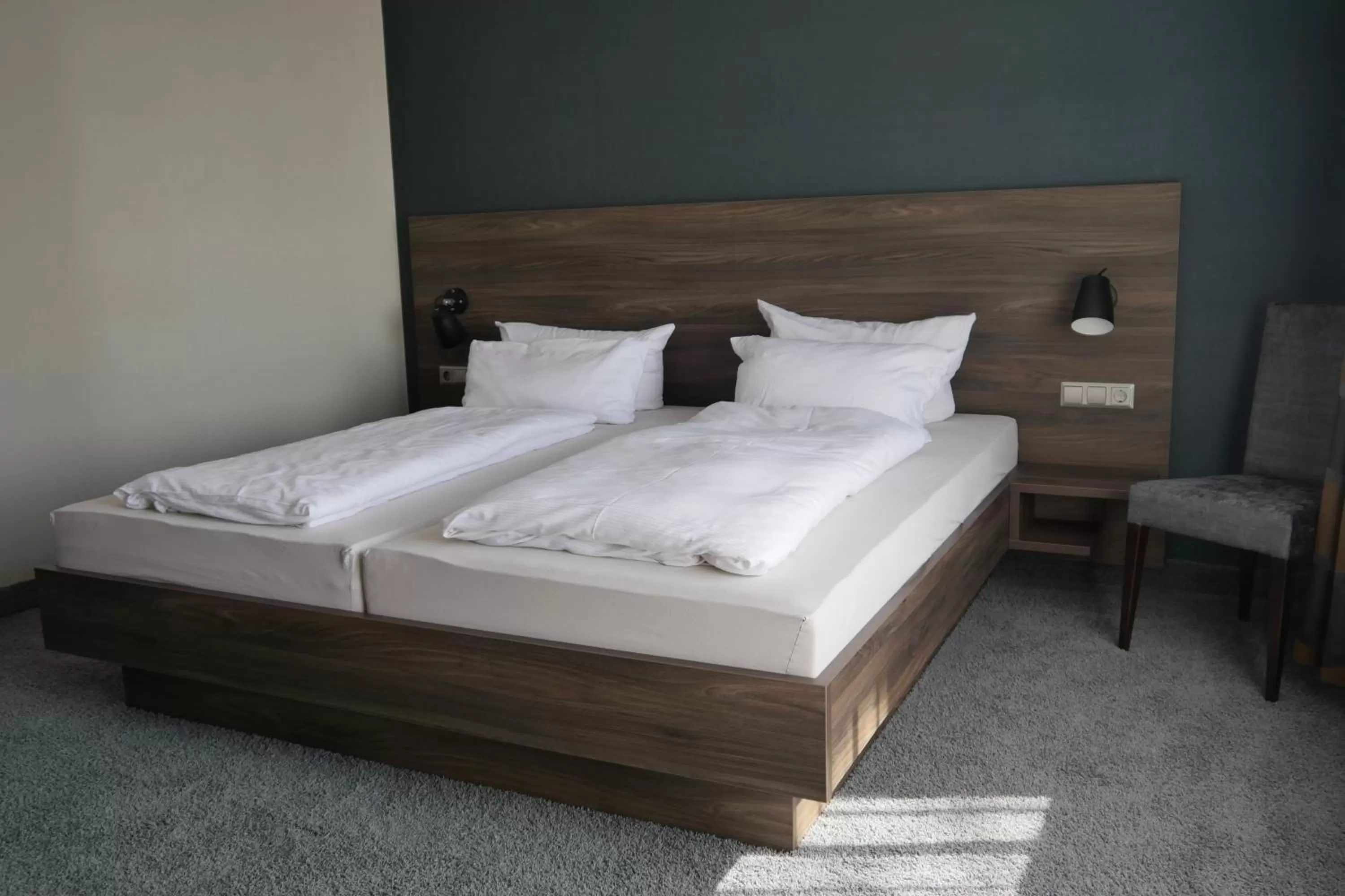 Bed in NaturKulturHotel Stumpf