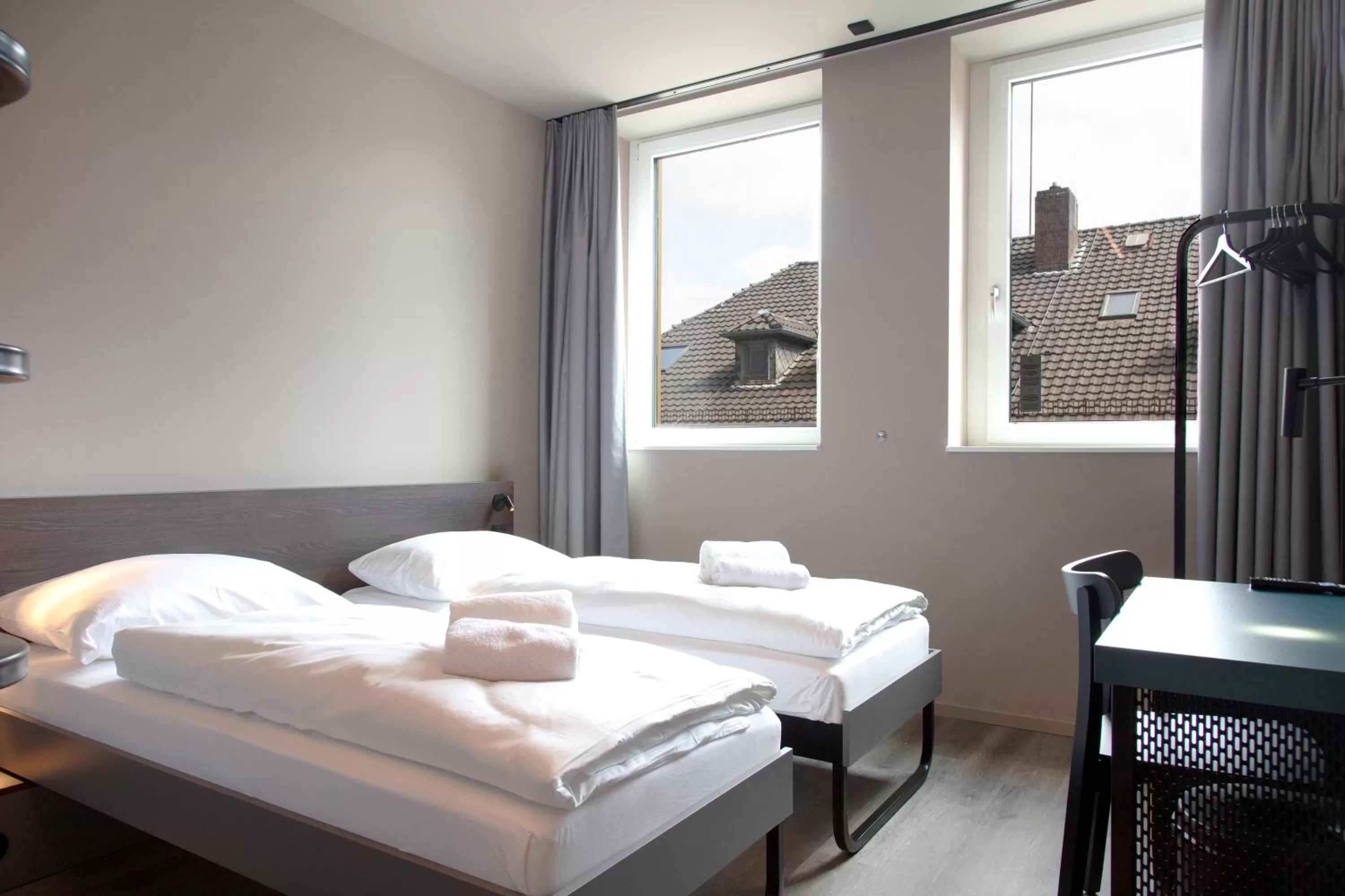 Photo of the whole room, Bed in MEININGER Hotel Bremen Hauptbahnhof