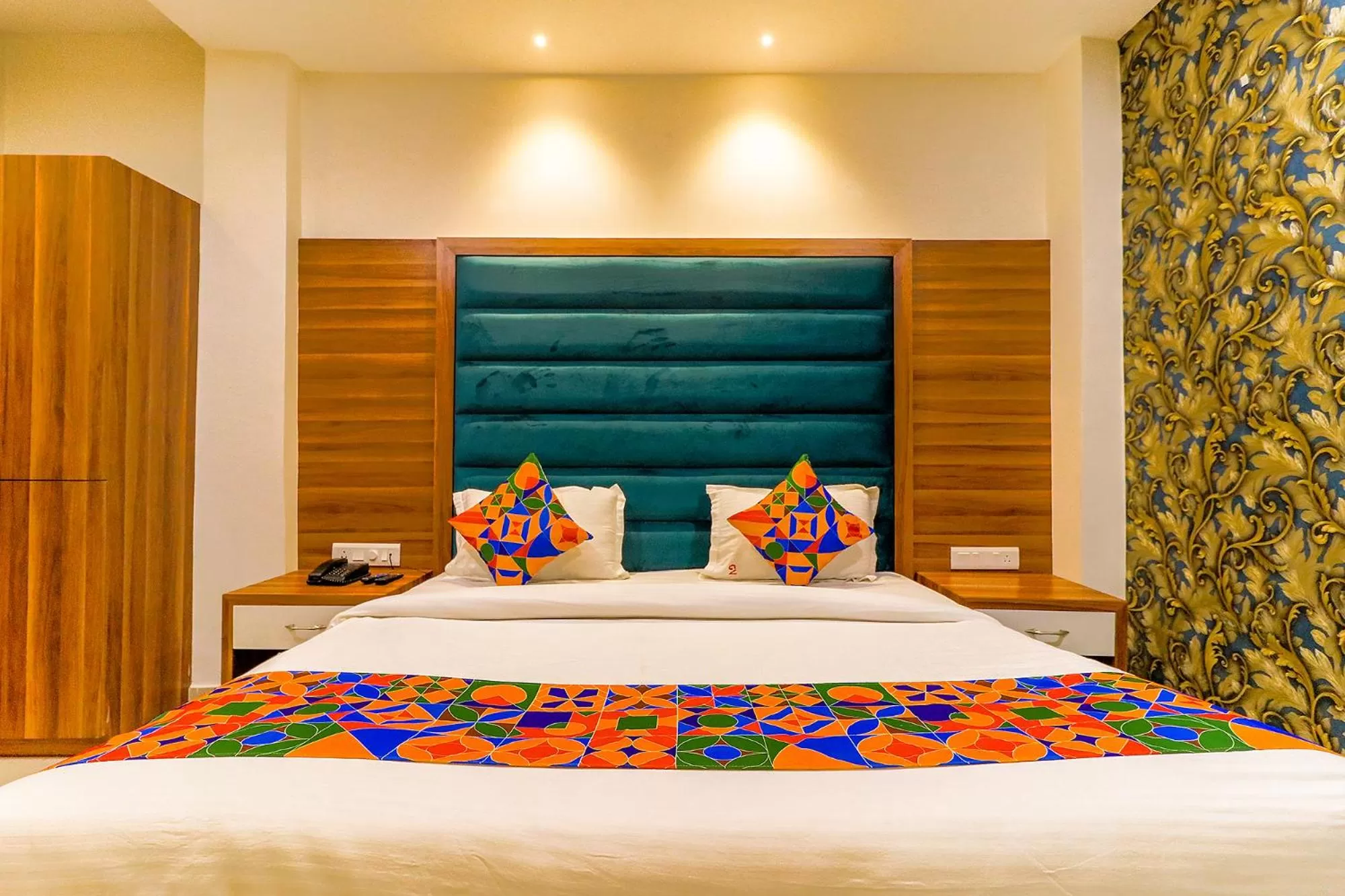 Bed in FabHotel Golden Velvet