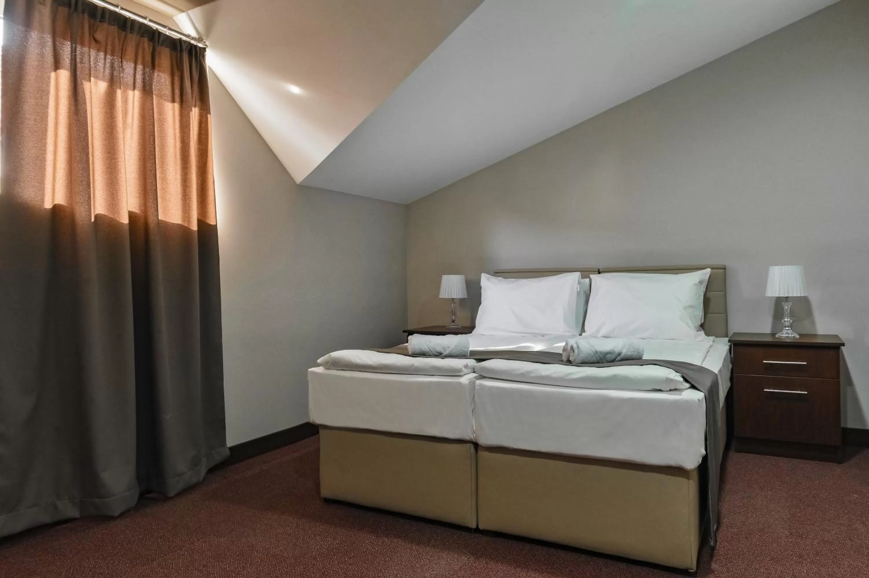 Bed in Garni Hotel Aline