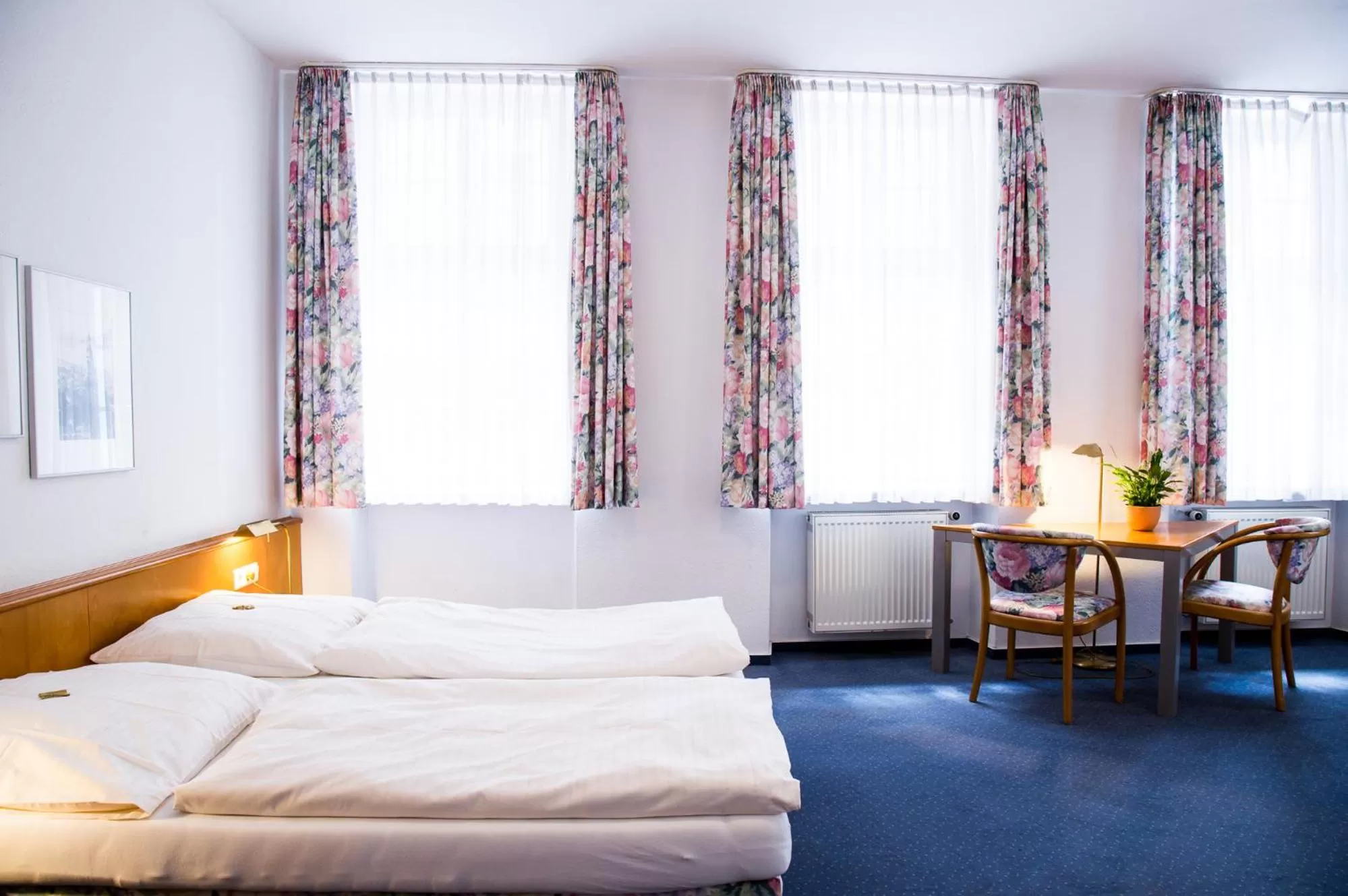 Bed in Hotel am Rathaus