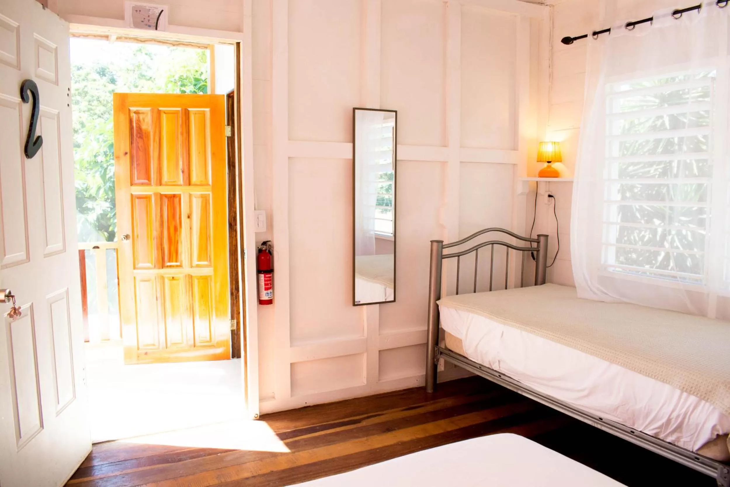 Bed, Seating Area in Horse Cottage